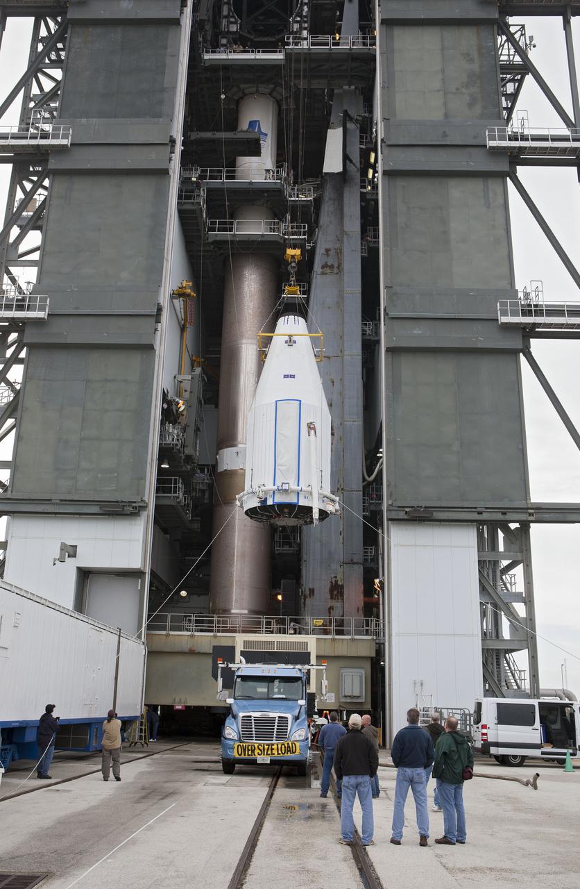 CAPE CANAVERAL, Fla. –- Enclosed in its payload fairing, NASA's Tracking and Data Relay Satellite, TDRS-K, is being lifted for placement atop a United Launch Alliance Atlas V rocket at Cape Canaveral Air Force Station's Space Launch Complex 41. Liftoff for the TDRS-K is planned for January 30, 2013. The TDRS-K spacecraft is part of the next-generation series in the Tracking and Data Relay Satellite System, a constellation of space-based communication satellites providing tracking, telemetry, command and high-bandwidth data return services. For more information, visit http:__www.nasa.gov_mission_pages_tdrs_index.html Photo credit: NASA_ Glenn Bension