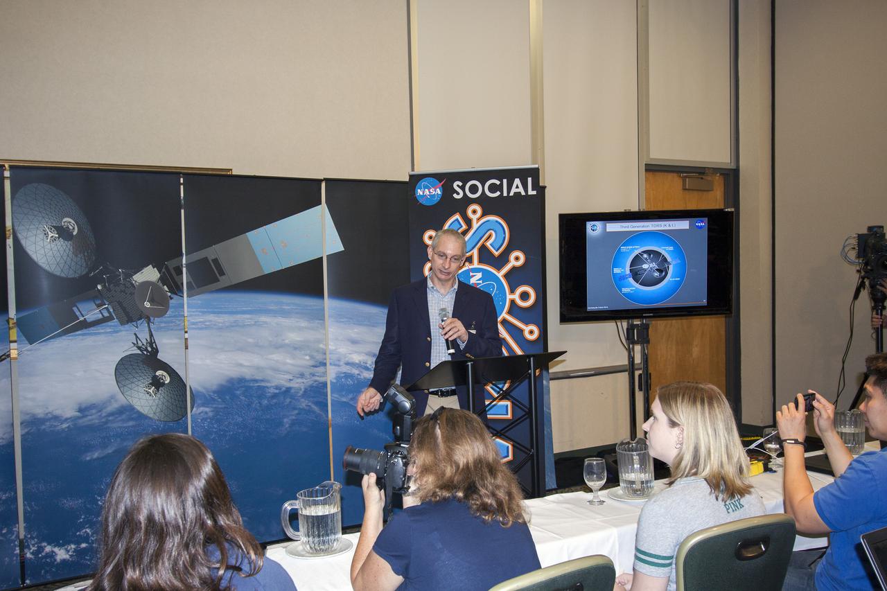 CAPE CANAVERAL, Fla. -- At NASA's Kennedy Space Center in Florida, Jeff Gramling, project manager for NASA's Tracking and Data Relay Satellite-K, addresses agency social media followers on the first day of activities of a NASA Social revolving around the satellite's mission. NASA Socials are in-person meetings for people who engage with the agency through Twitter, Facebook, Google+ and other social networks. The satellite, known as TDRS-K, is set to launch at 8:48 p.m. EST on Jan. 30 aboard a United Launch Alliance Atlas V rocket from Space Launch Complex 41 on nearby Cape Canaveral Air Force Station. About 50 followers were selected to participate in the TDRS-K prelaunch and launch activities and share them with their own fan base. The TDRS-K spacecraft is part of the next-generation series in the Tracking and Data Relay Satellite System, a constellation of space-based communication satellites providing tracking, telemetry, command and high-bandwidth data return services. For more information, visit http:__www.nasa.gov_mission_pages_tdrs_index.html. Photo credit: NASA_Jim Grossmann