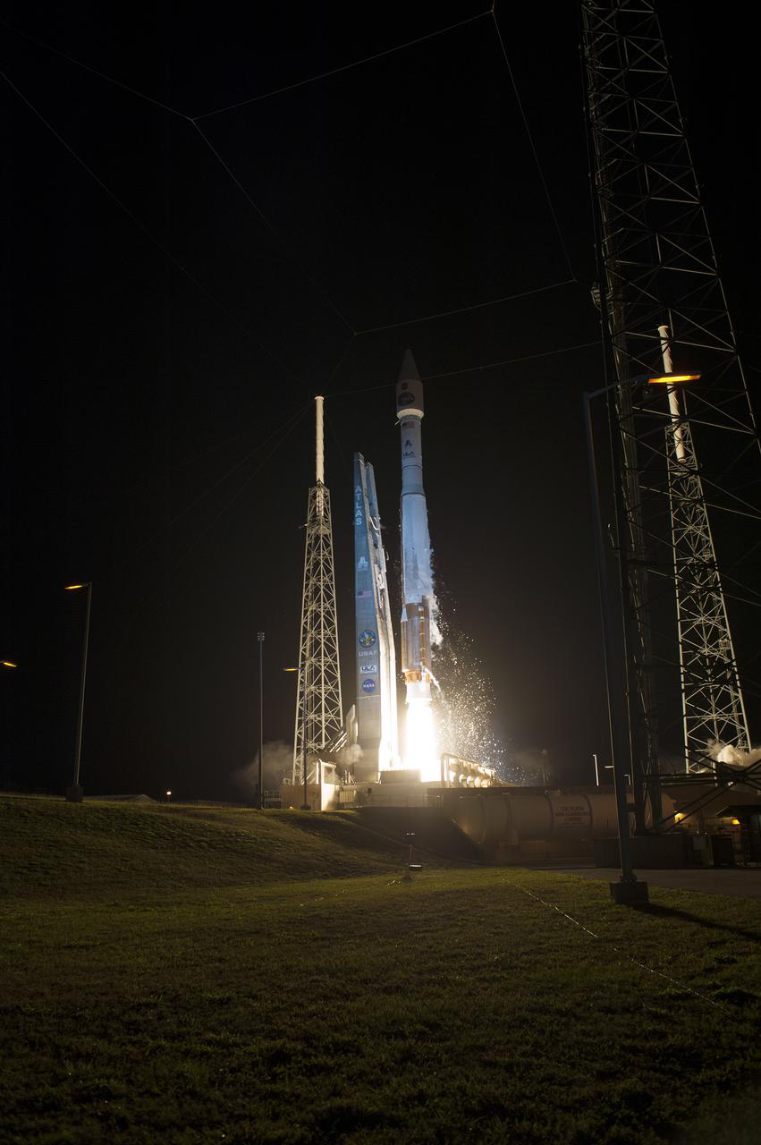 CAPE CANAVERAL, Fla. -- A United Launch Alliance Atlas V 401 rocket springs to life on Space Launch Complex 41 on Cape Canaveral Air Force Station in Florida at 8:48 p.m. EST, carrying NASA's Tracking and Data Relay Satellite-K, TDRS-K, to orbit.  The TDRS-K spacecraft is part of the next-generation series in the Tracking and Data Relay Satellite System, a constellation of space-based communication satellites providing tracking, telemetry, command and high-bandwidth data return services. For more information, visit http:__www.nasa.gov_mission_pages_tdrs_index.html.  Photo credit: NASA_Tony Gray and Rick Wetherington