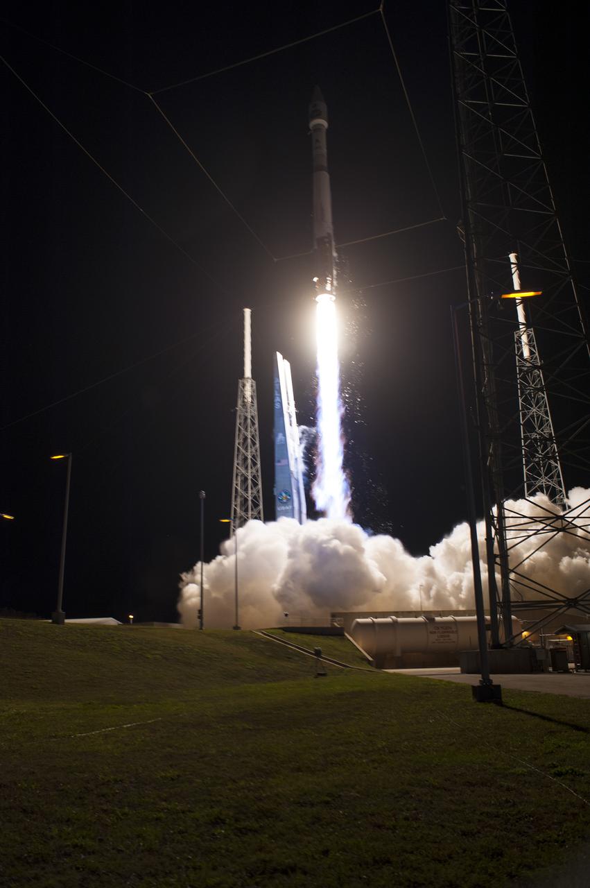 CAPE CANAVERAL, Fla. -- A United Launch Alliance Atlas V 401 rocket rushes past the lightning masts on Space Launch Complex 41 on Cape Canaveral Air Force Station in Florida, leaving plumes of exhaust and smoke in its wake. Its payload, NASA's Tracking and Data Relay Satellite-K or TDRS-K, began its climb to orbit at 8:48 p.m. EST. The TDRS-K spacecraft is part of the next-generation series in the Tracking and Data Relay Satellite System, a constellation of space-based communication satellites providing tracking, telemetry, command and high-bandwidth data return services. For more information, visit http:__www.nasa.gov_mission_pages_tdrs_index.html. Photo credit: NASA_Tony Gray and Rick Wetherington