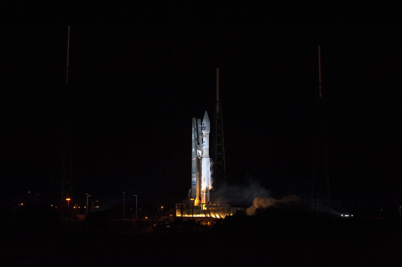 CAPE CANAVERAL, Fla. -- The engines ignite under the United Launch Alliance Atlas V 401 rocket at Space Launch Complex 41 on Cape Canaveral Air Force Station in Florida. NASA's Tracking and Data Relay Satellite-K, TDRS-K, began its journey to orbit at 8:48 p.m. EST.  The TDRS-K spacecraft is part of the next-generation series in the Tracking and Data Relay Satellite System, a constellation of space-based communication satellites providing tracking, telemetry, command and high-bandwidth data return services. For more information, visit http:__www.nasa.gov_mission_pages_tdrs_index.html.  Photo credit: NASA_Tony Gray and Rick Wetherington