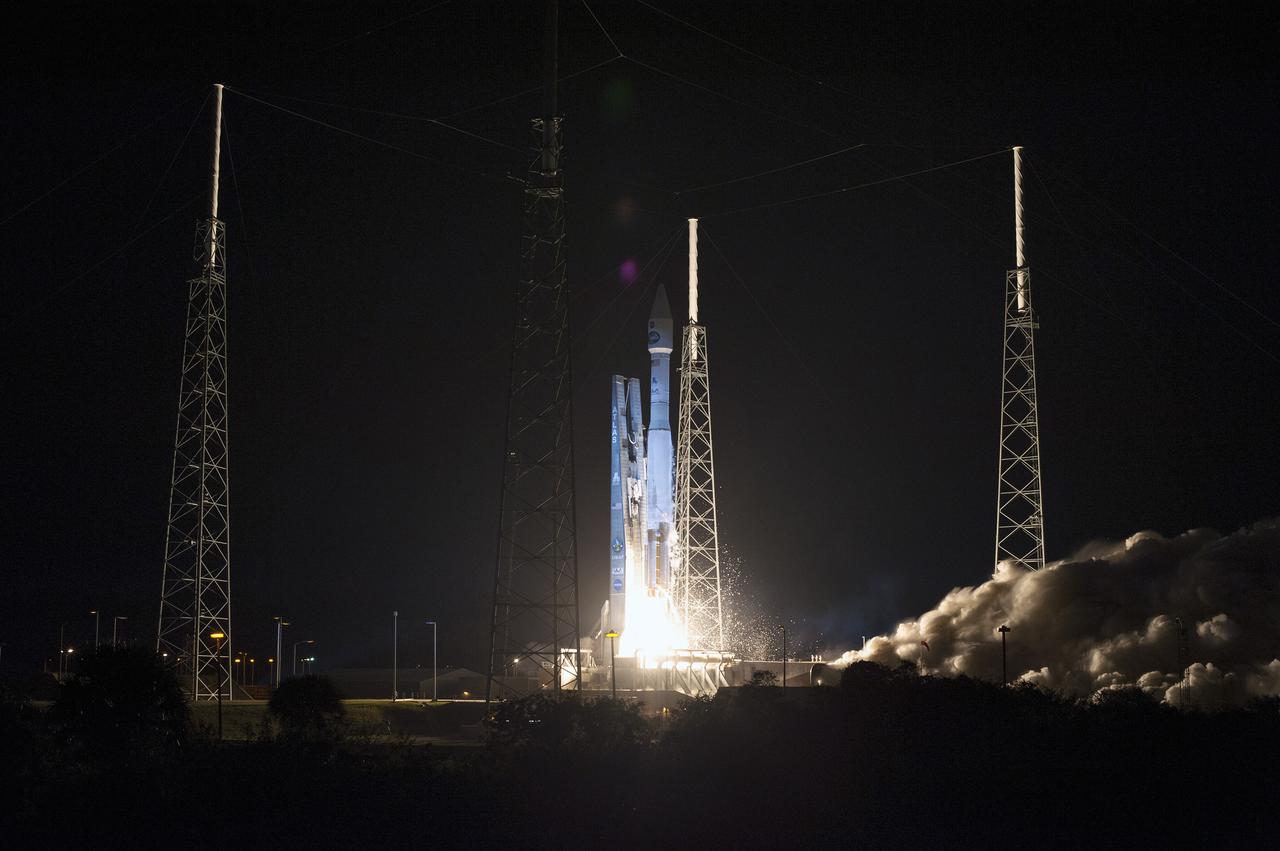 CAPE CANAVERAL, Fla. -- A United Launch Alliance Atlas V 401 rocket hovers above the hardstand on Space Launch Complex 41 on Cape Canaveral Air Force Station in Florida as its engines ignite.  Liftoff, with NASA's Tracking and Data Relay Satellite-K or TDRS-K aboard, was at 8:48 p.m. EST.   he TDRS-K spacecraft is part of the next-generation series in the Tracking and Data Relay Satellite System, a constellation of space-based communication satellites providing tracking, telemetry, command and high-bandwidth data return services. For more information, visit http:__www.nasa.gov_mission_pages_tdrs_index.html.  Photo credit: NASA_Tony Gray and Rick Wetherington