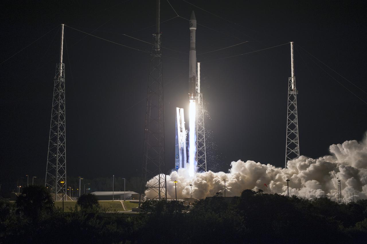 CAPE CANAVERAL, Fla. -- The umbilical tower drops back from a United Launch Alliance Atlas V 401 rocket as it lifts off Space Launch Complex 41 on Cape Canaveral Air Force Station in Florida.  Launch, with NASA's Tracking and Data Relay Satellite-K or TDRS-K aboard, was at 8:48 p.m. EST.  he TDRS-K spacecraft is part of the next-generation series in the Tracking and Data Relay Satellite System, a constellation of space-based communication satellites providing tracking, telemetry, command and high-bandwidth data return services. For more information, visit http:__www.nasa.gov_mission_pages_tdrs_index.html.  Photo credit: NASA_Tony Gray and Rick Wetherington