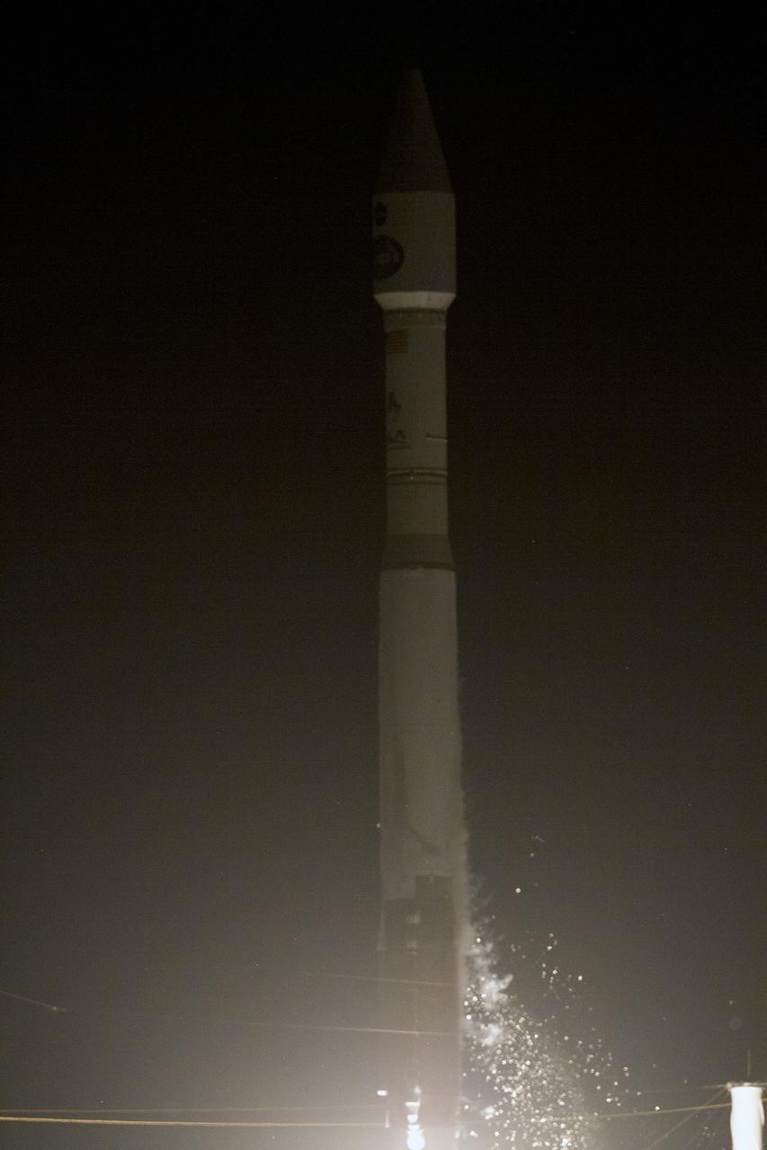 CAPE CANAVERAL, Fla. -- Ice crystals sparkle in the spotlights on Space Launch Complex 41 on Cape Canaveral Air Force Station in Florida as they fall away from a United Launch Alliance Atlas V 401 rocket lifting off at 8:48 p.m. EST to place NASA's Tracking and Data Relay Satellite-K, TDRS-K, in orbit. The ice forms on the rocket's fuel tank before launch, a byproduct of its super-cold propellants.  The TDRS-K spacecraft is part of the next-generation series in the Tracking and Data Relay Satellite System, a constellation of space-based communication satellites providing tracking, telemetry, command and high-bandwidth data return services. For more information, visit http:__www.nasa.gov_mission_pages_tdrs_index.html.  Photo credit: NASA_George Roberts