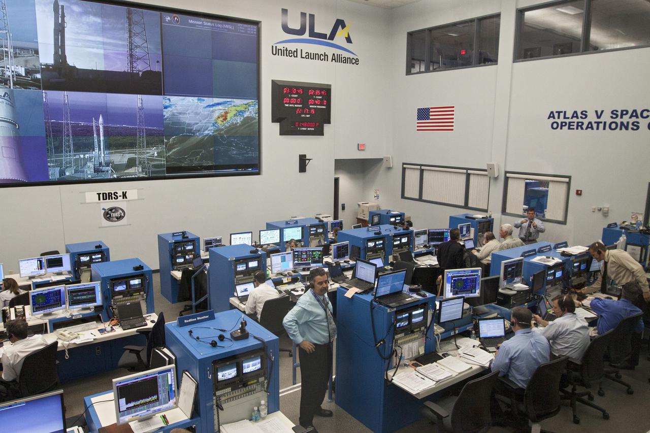 CAPE CANAVERAL, Fla. – The NASA and United Launch Alliance launch teams monitor the countdown before the launch of the TDRS-K spacecraft on an Atlas V rocket. The teams work inside the Atlas Space Operations Center at Cape Canaveral Air Force Station, Fla., known as the ASOC. Photo credit: NASA_Kim Shiflett