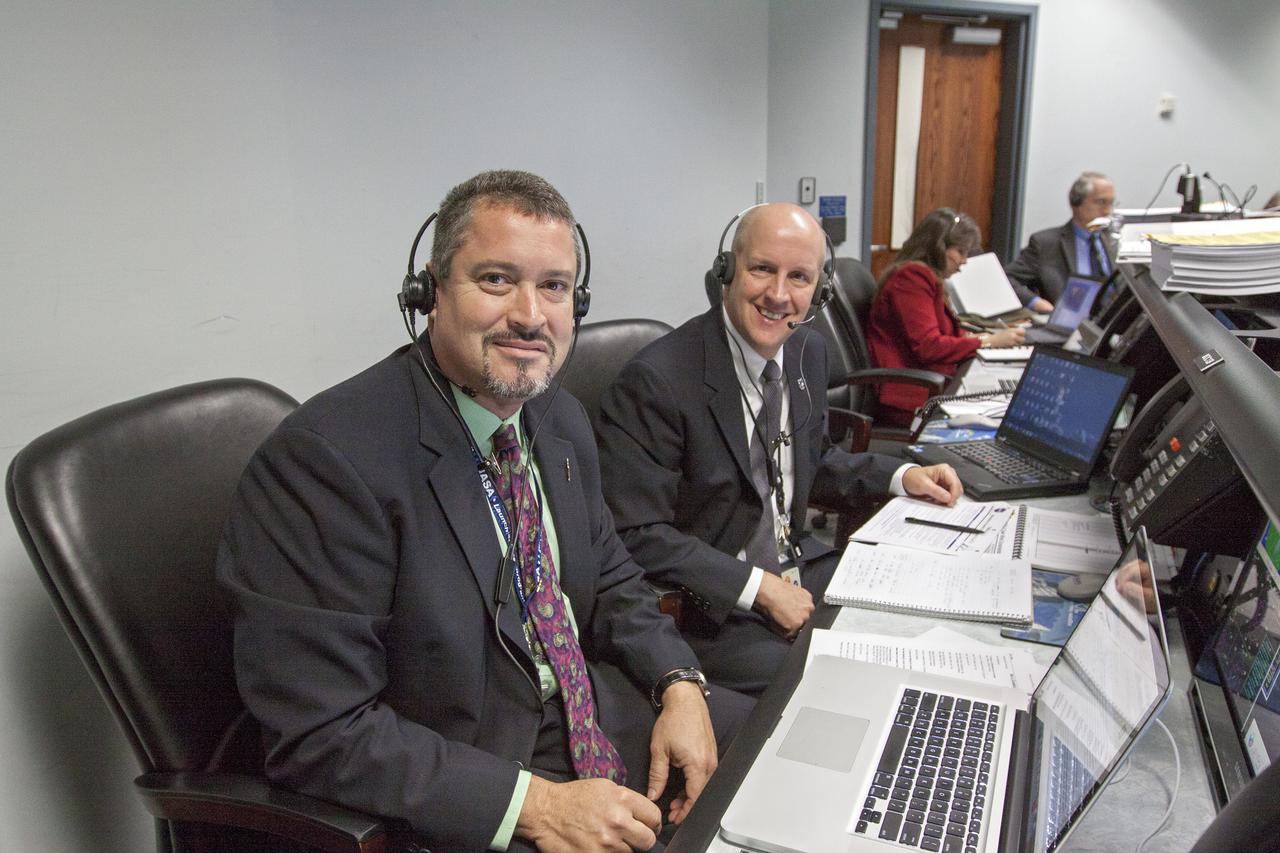 CAPE CANAVERAL, Fla. – Tim Dunn, NASA launch manager, center, monitors the countdown for the launch of the TDRS-K spacecraft on an Atlas V rocket. Omar Baez, assistant NASA launch manager, left, and Diana Calero, NASA mission manager, right, also participate in the countdown procedures before the liftoff. The launch teams for NASA and the United Launch Alliance work inside the Atlas Space Operations Center at Cape Canaveral Air Force Station, Fla., known as the ASOC. Photo credit: NASA_Kim Shiflett