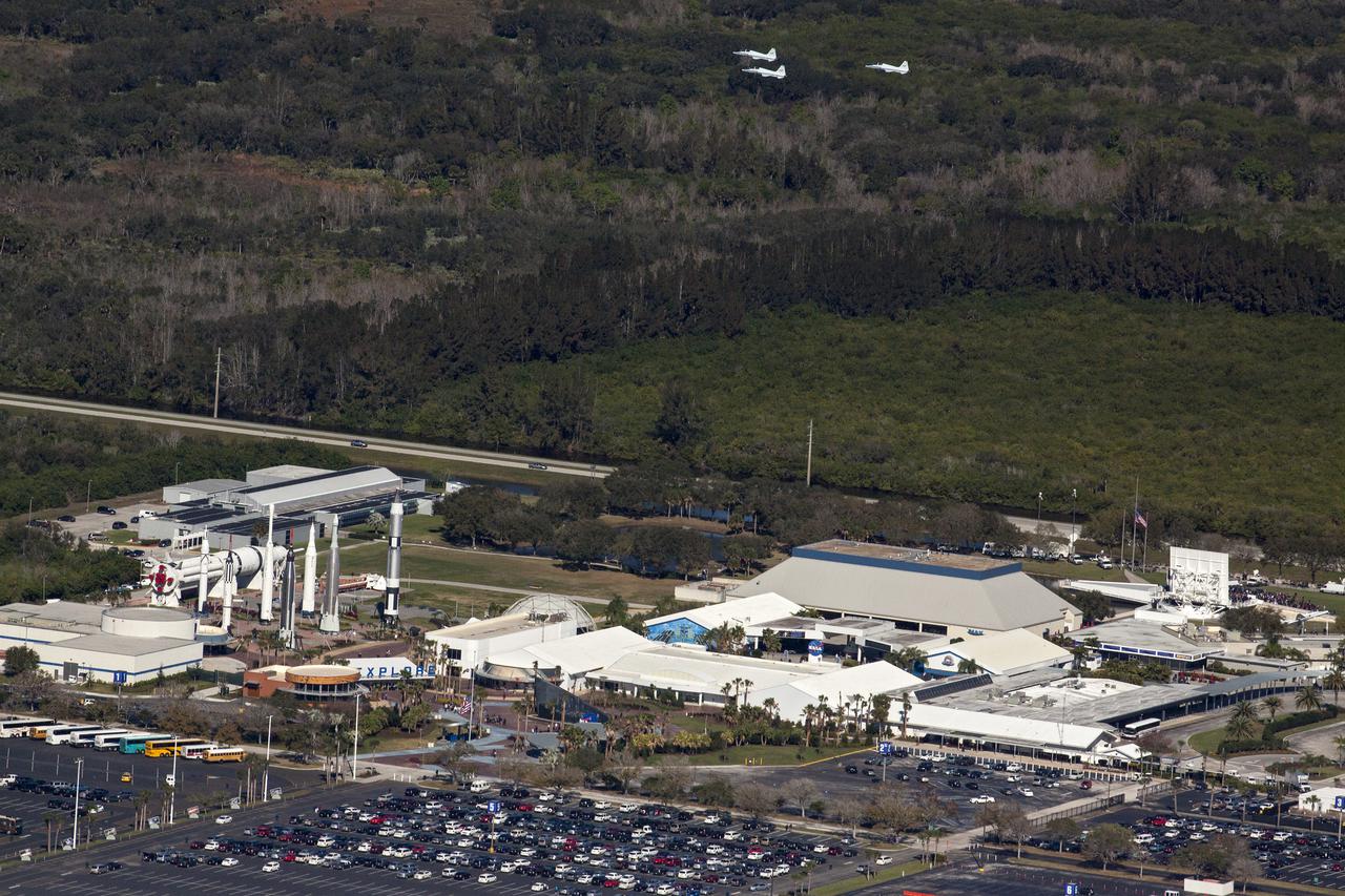 CAPE CANAVERAL, Fla. – Three NASA T-38 aircraft fly in formation over the Kennedy Space Center Visitor Complex during the agency's Day of Remembrance ceremony. NASA's Kennedy Space Center, Fla., honored the crews of Apollo 1 and space shuttles Challenger and Columbia, as well as other NASA colleagues, during the observance on Friday, Feb. 1, the 10th anniversary of the Columbia tragedy. The annual Day of Remembrance honors members of the NASA family who lost their lives while furthering the cause of exploration and discovery. Photo credit: NASA_Kim Shiflett