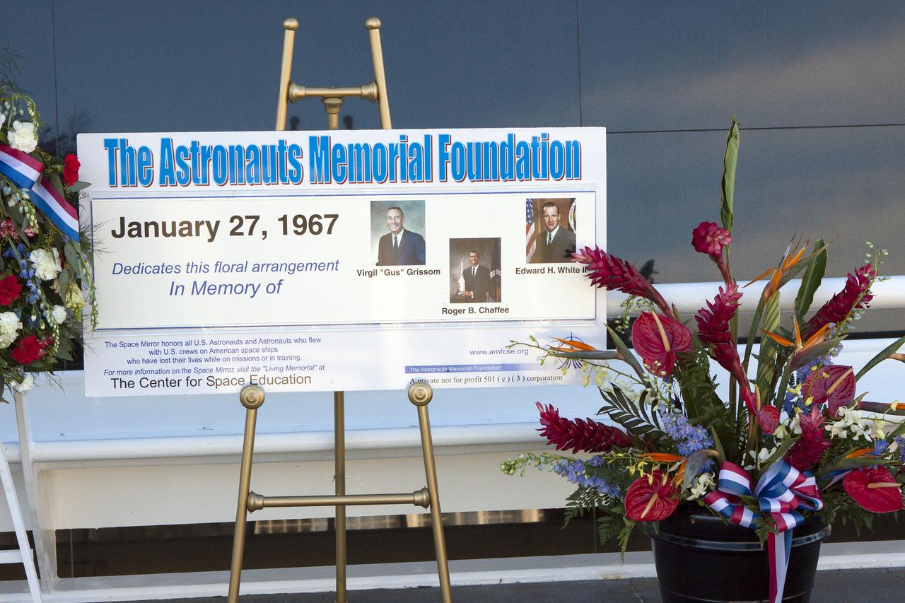CAPE CANAVERAL, Fla. -- Kennedy Space Center Employees and guests placed wreaths and flowers at the Space Mirror Memorial at the spaceport's Visitor Complex during NASA's Day of Remembrance. The annual event took place on the 10th anniversary of the loss of the space shuttle Columbia and its crew and was hosted by the Astronauts Memorial Foundation. The ceremony also honored the astronauts of Apollo 1, who perished in 1967, and the shuttle Challenger, lost in 1986, as well as other astronauts who lost their lives while furthering the cause of exploration and discovery.   Dedicated in 1991, the names of fallen astronauts are emblazoned the monument's 4.5-foot-high-by-50-foot-wide polished black granite surface which reflects the sky and has been designated by Congress as a National Memorial. Photo credit: NASA_Jim Grossmann