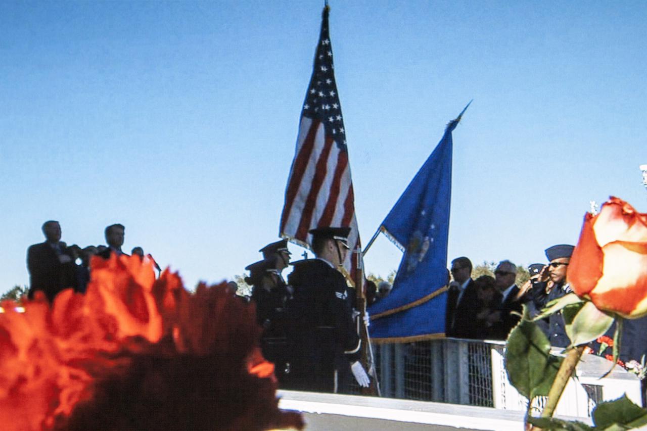 CAPE CANAVERAL, Fla. -- The Patrick Air Force Base honor guard participates in the Day of Remembrance ceremony at the Kennedy Space Center Visitor Complex. Space center employees and guests gathered at the Space Mirror Memorial at the visitor complex for the annual event which took place on the 10th anniversary of the loss of the space shuttle Columbia and its crew.   The ceremony also honored the astronauts of Apollo 1 and the shuttle Challenger. Dedicated in 1991, the names of fallen astronauts are emblazoned the Space Mirror Memorial's 4.5-foot-high-by-50-foot-wide polished black granite surface which reflects the sky and has been designated by Congress as a National Memorial. Image credit: NASA Television