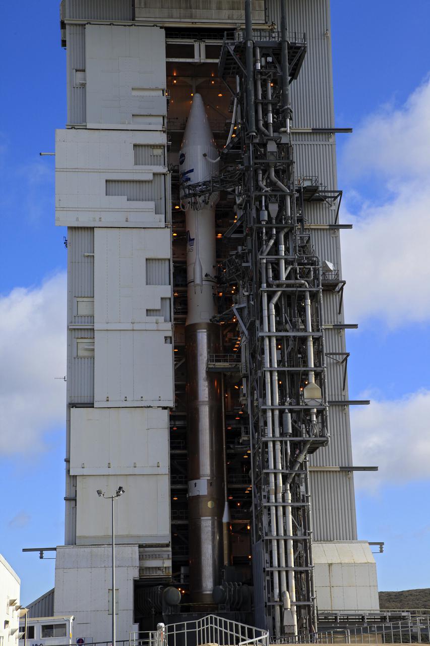 VANDENBERG AFB, Calif. -- At Vandenberg Air Force Base, Calif., NASA's Landsat Data Continuity Mission, or LDCM, satellite is mounted atop a United Launch Alliance Atlas V rocket in the gantry at Space Launch Complex 3E. The Landsat Data Continuity Mission LDCM is the future of Landsat satellites. It will continue to obtain valuable data and imagery to be used in agriculture, education, business, science, and government. The Landsat Program provides repetitive acquisition of high resolution multispectral data of the Earth's surface on a global basis. The data from the Landsat spacecraft constitute the longest record of the Earth's continental surfaces as seen from space. It is a record unmatched in quality, detail, coverage, and value. Liftoff is planned for Feb. 11, 2013 aboard a United Launch Alliance Atlas V rocket. For more information, visit: http:__www.nasa.gov_mission_pages_landsat_main_index.html Photo credit: NASA_Kim Shiflett