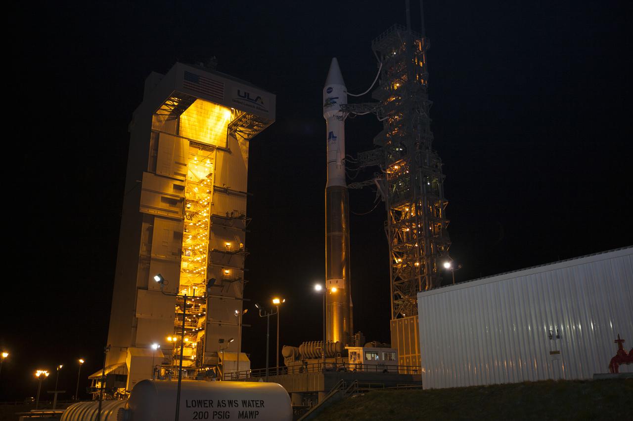 VANDENBERG AFB, Calif. -- At Vandenberg Air Force Base, Calif., the gantry at Space Launch Complex 3E rolls back from NASA's Landsat Data Continuity Mission, or LDCM, satellite mounted atop a United Launch Alliance Atlas V rocket.   The Landsat Data Continuity Mission LDCM is the future of Landsat satellites. It will continue to obtain valuable data and imagery to be used in agriculture, education, business, science, and government. The Landsat Program provides repetitive acquisition of high resolution multispectral data of the Earth's surface on a global basis. The data from the Landsat spacecraft constitute the longest record of the Earth's continental surfaces as seen from space. It is a record unmatched in quality, detail, coverage, and value. Liftoff is planned for Feb. 11, 2013 aboard a United Launch Alliance Atlas V rocket. For more information, visit: http:__www.nasa.gov_mission_pages_landsat_main_index.html Photo credit: NASA_Kim Shiflett
