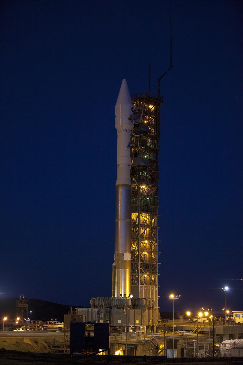 VANDENBERG AFB, Calif. -- At Vandenberg Air Force Base, Calif., NASA's Landsat Data Continuity Mission, or LDCM, satellite is mounted atop a United Launch Alliance Atlas V rocket poised for launch at Space Launch Complex 3E.   The Landsat Data Continuity Mission LDCM is the future of Landsat satellites. It will continue to obtain valuable data and imagery to be used in agriculture, education, business, science, and government. The Landsat Program provides repetitive acquisition of high resolution multispectral data of the Earth's surface on a global basis. The data from the Landsat spacecraft constitute the longest record of the Earth's continental surfaces as seen from space. It is a record unmatched in quality, detail, coverage, and value. Liftoff is planned for Feb. 11, 2013 aboard a United Launch Alliance Atlas V rocket. For more information, visit: http:__www.nasa.gov_mission_pages_landsat_main_index.html Photo credit: NASA_Kim Shiflett