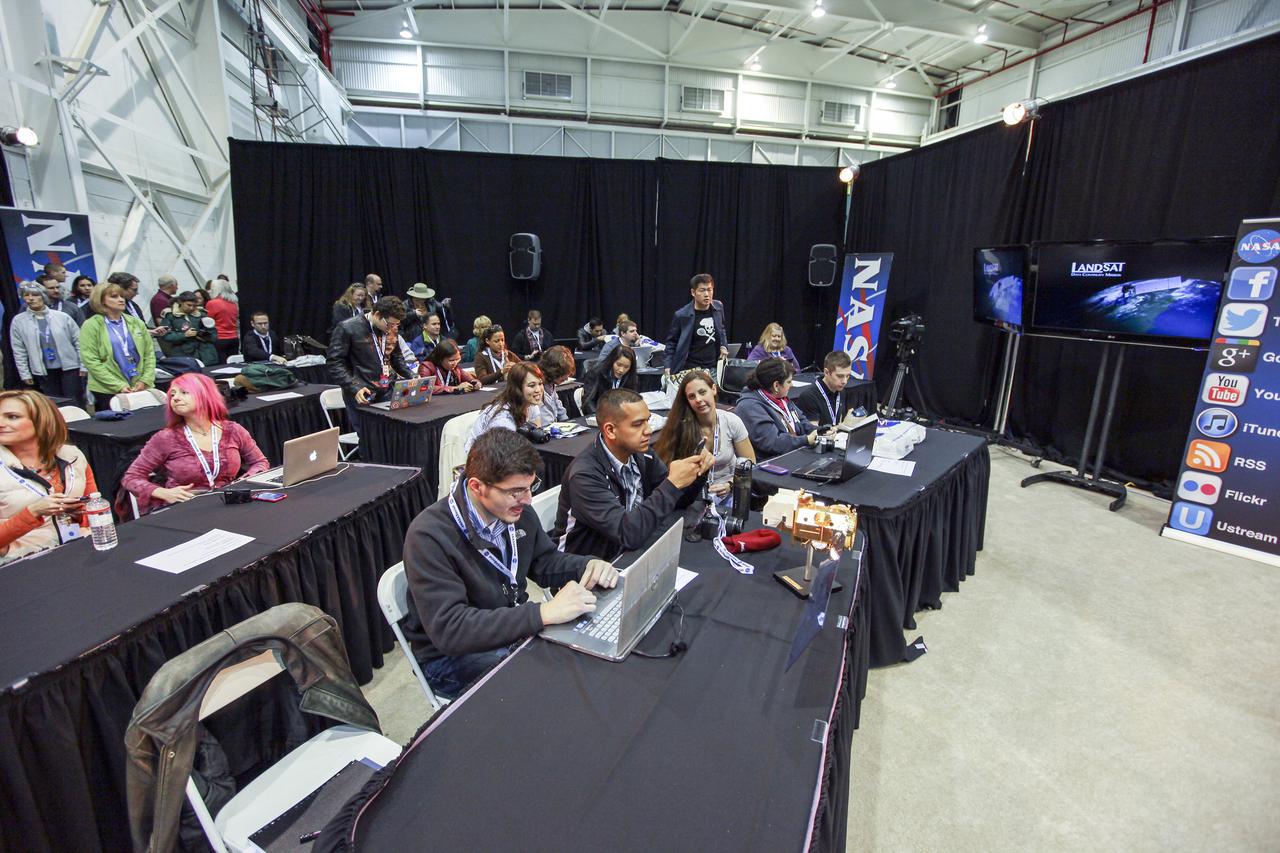 VANDENBERG AFB, Calif. -- NASA social media followers at Vandenberg Air Force Base, Calif., listen to speakers describing the agency's Landsat Data Continuity Mission, or LDCM, satellite. The Landsat Data Continuity Mission LDCM is the future of Landsat satellites. It will continue to obtain valuable data and imagery to be used in agriculture, education, business, science, and government. The Landsat Program provides repetitive acquisition of high resolution multispectral data of the Earth's surface on a global basis. The data from the Landsat spacecraft constitute the longest record of the Earth's continental surfaces as seen from space. It is a record unmatched in quality, detail, coverage, and value. Liftoff is planned for Feb. 11, 2013 aboard a United Launch Alliance Atlas V rocket. For more information, visit: http:__www.nasa.gov_mission_pages_landsat_main_index.html Photo credit: NASA_Kim Shiflett