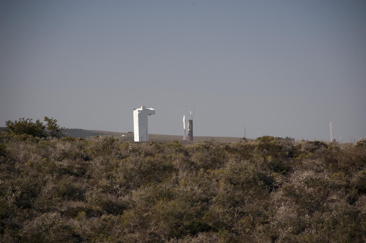 VANDENBERG AFB, Calif. -- The Landsat Data Continuity Mission spacecraft is poised for lift off atop a United Launch Alliance Atlas V rocket from Space Launch Complex 3 at California's Vandenberg Air Force Base.   The Landsat Data Continuity Mission LDCM is the future of Landsat satellites. It will continue to obtain valuable data and imagery to be used in agriculture, education, business, science, and government. The Landsat Program provides repetitive acquisition of high resolution multispectral data of the Earth's surface on a global basis. The data from the Landsat spacecraft constitute the longest record of the Earth's continental surfaces as seen from space. It is a record unmatched in quality, detail, coverage, and value. For more information, visit: http:__www.nasa.gov_mission_pages_landsat_main_index.html Photo credit: NASA_Ben Smegelsky