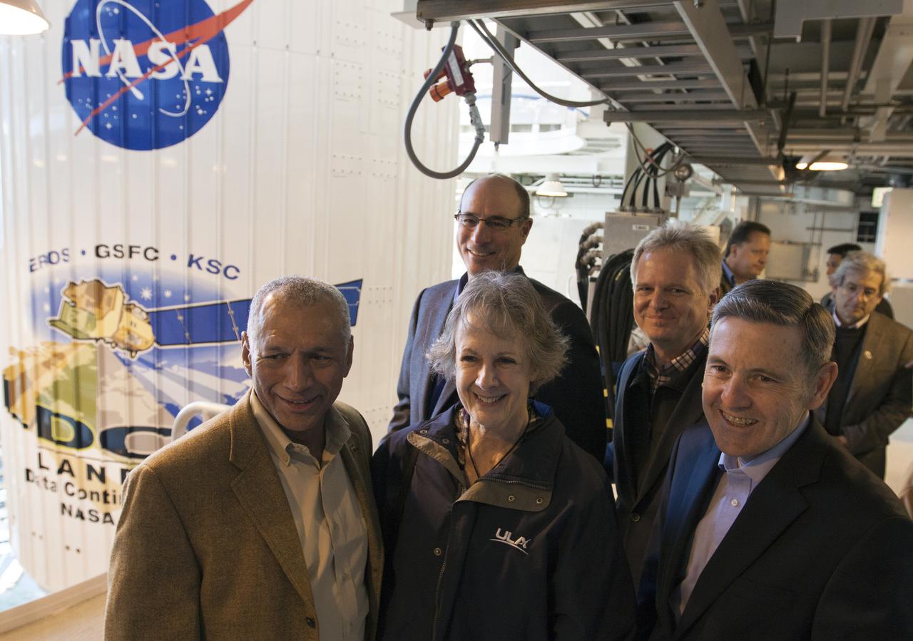 VANDENBERG AFB, Calif. -- NASA officials tour Space Launch Complex 3E at Vandenberg Air Force Base, prior to the launch of the Landsat Data Continuity Mission, or LDCM, satellite. In the front row, from the left, are NASA Administrator Charles Bolden, Anne Castle, assistant secretary for Water and Science, U.S. Department of the Interior, and Kennedy Space Center Director Bob Cabana. In the background is the payload fairing containing the LDCM satellite which is mounted atop an Atlas V rocket.   The Landsat Data Continuity Mission LDCM is the future of Landsat satellites. It will continue to obtain valuable data and imagery to be used in agriculture, education, business, science, and government. The Landsat Program provides repetitive acquisition of high resolution multispectral data of the Earth's surface on a global basis. The data from the Landsat spacecraft constitute the longest record of the Earth's continental surfaces as seen from space. It is a record unmatched in quality, detail, coverage, and value. Liftoff is planned for Feb. 11, 2013 aboard a United Launch Alliance Atlas V rocket. For more information, visit: http:__www.nasa.gov_mission_pages_landsat_main_index.html Photo credit: NASA_Kim Shiflett