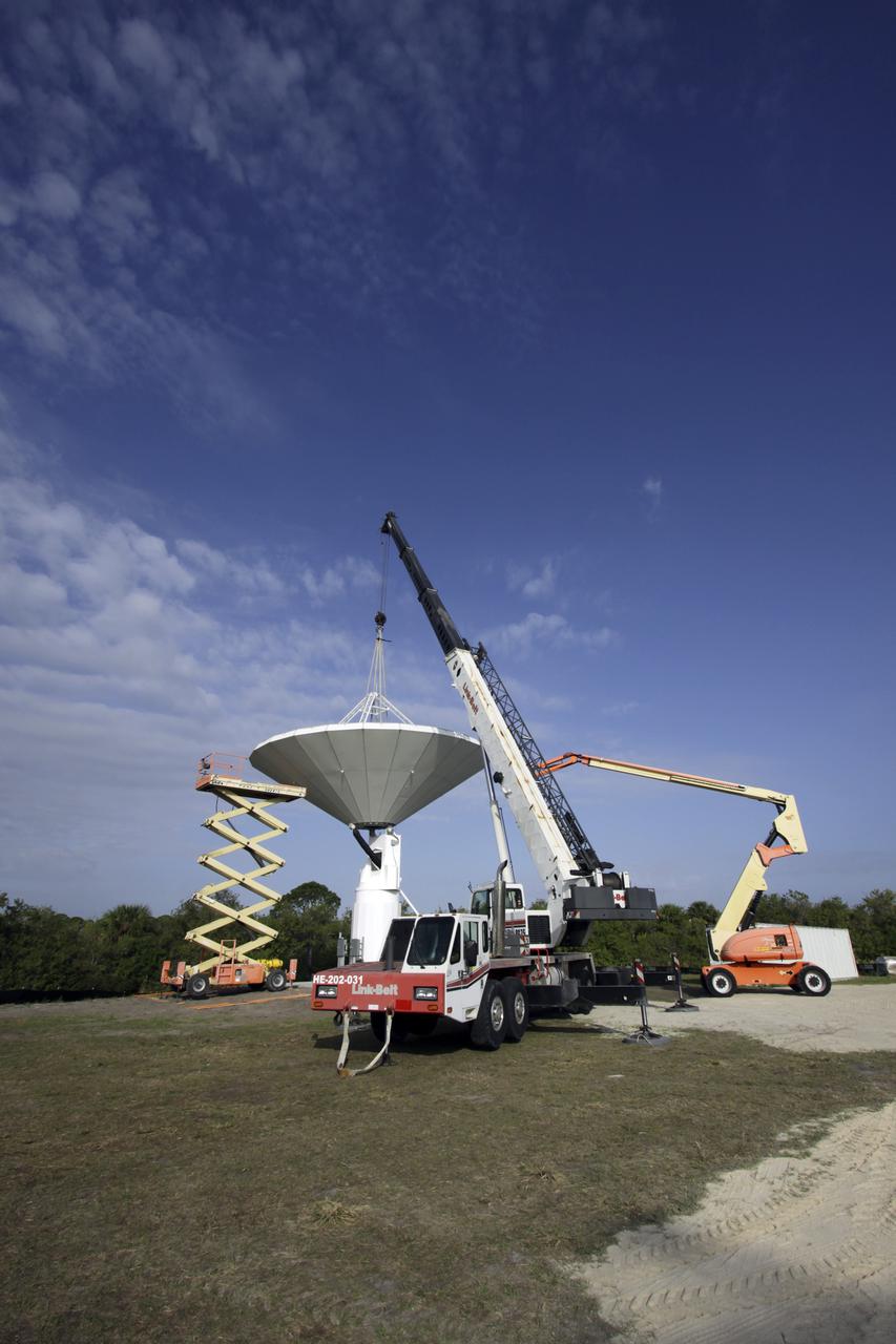 CAPE CANAVERAL, Fla. – At NASA’s Kennedy Space Center in Florida, 40-foot-diameter dish antenna arrays are being constructed as part of the Antenna Test Bed Array for the Ka-Band Objects Observation and Monitoring, or Ka-BOOM system. The antennas will be part of the operations command center facility. The construction site is near the former Vertical Processing Facility, which has been demolished. The Ka-BOOM project is one of the final steps in developing the techniques to build a high power, high resolution radar system capable of becoming a Near Earth Object Early Warning System. While also capable of space communication and radio science experiments, developing radar applications is the primary focus of the arrays. Photo credit: NASA_Jim Grossmann