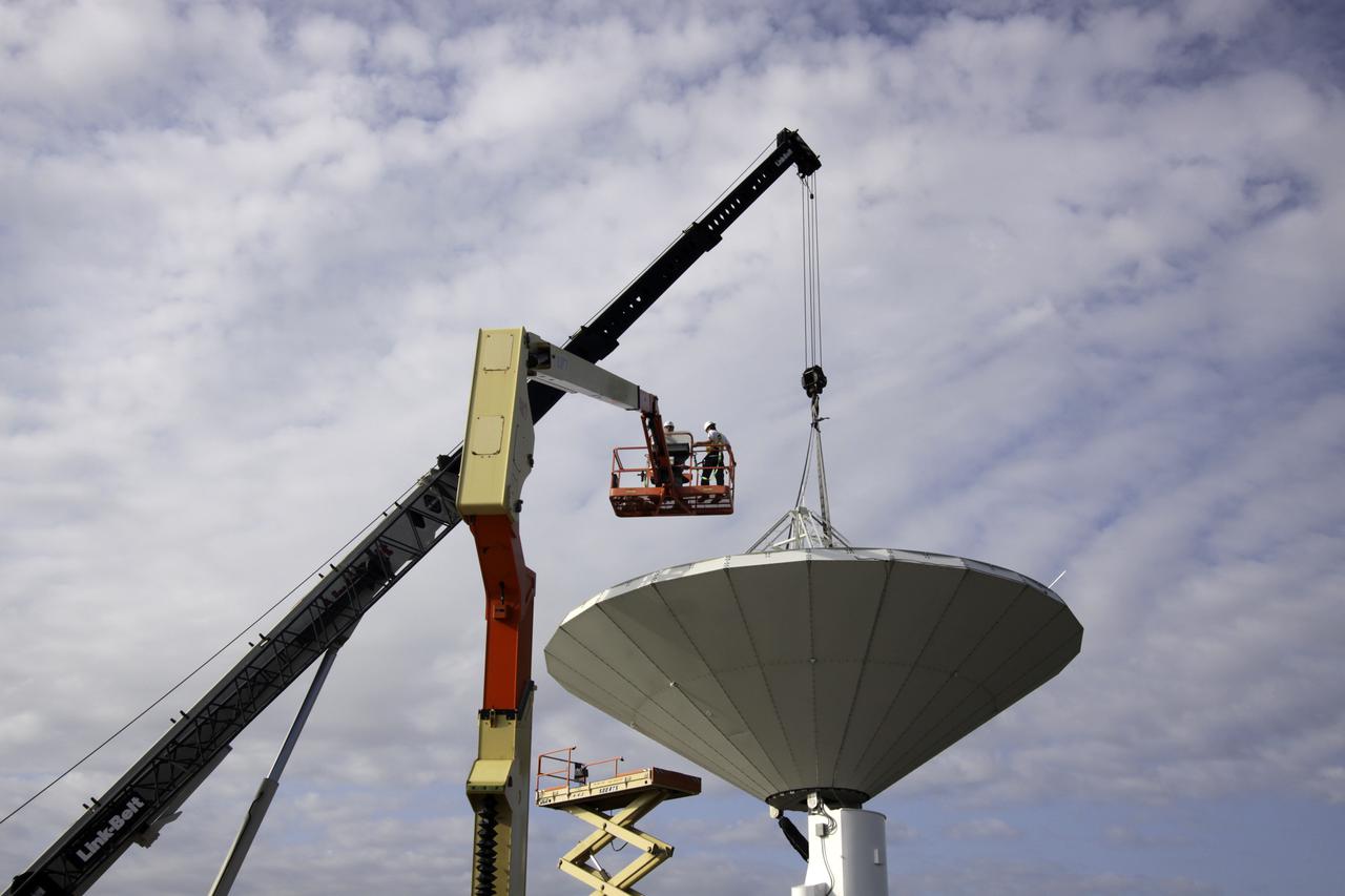 CAPE CANAVERAL, Fla. – At NASA’s Kennedy Space Center in Florida, 40-foot-diameter dish antenna arrays are being constructed as part of the Antenna Test Bed Array for the Ka-Band Objects Observation and Monitoring, or Ka-BOOM system. The antennas will be part of the operations command center facility. The construction site is near the former Vertical Processing Facility, which has been demolished. The Ka-BOOM project is one of the final steps in developing the techniques to build a high power, high resolution radar system capable of becoming a Near Earth Object Early Warning System. While also capable of space communication and radio science experiments, developing radar applications is the primary focus of the arrays. Photo credit: NASA_Jim Grossmann