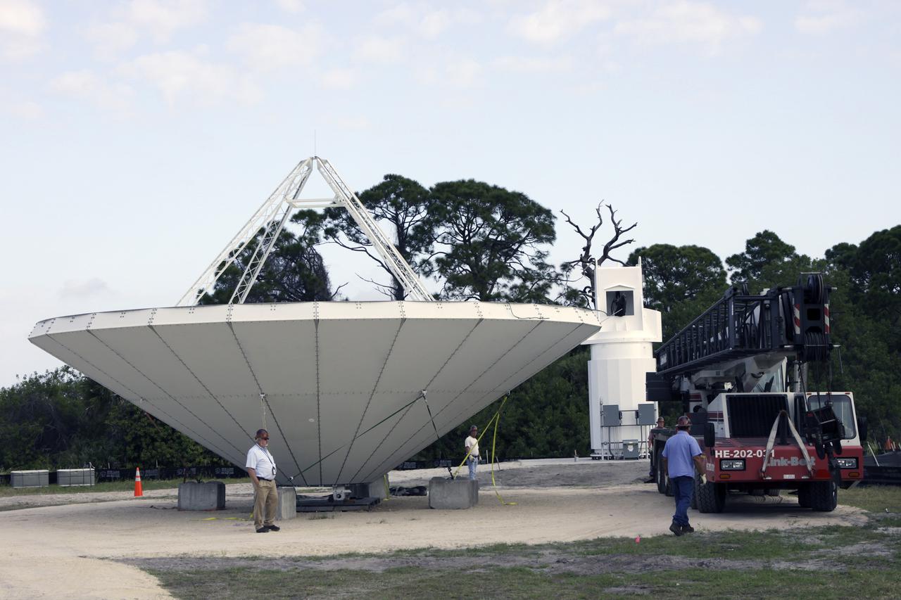 CAPE CANAVERAL, Fla. – At NASA’s Kennedy Space Center in Florida, 40-foot-diameter dish antenna arrays are being constructed as part of the Antenna Test Bed Array for the Ka-Band Objects Observation and Monitoring, or Ka-BOOM system. The antennas will be part of the operations command center facility. The construction site is near the former Vertical Processing Facility, which has been demolished. The Ka-BOOM project is one of the final steps in developing the techniques to build a high power, high resolution radar system capable of becoming a Near Earth Object Early Warning System. While also capable of space communication and radio science experiments, developing radar applications is the primary focus of the arrays. Photo credit: NASA_Jim Grossmann