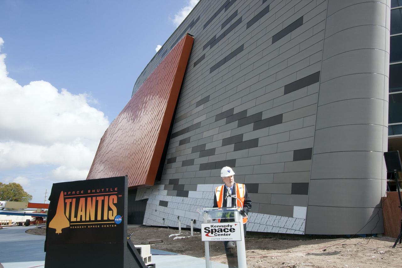 CAPE CANAVERAL, Fla. -- Bill Moore, Delaware North's chief operating officer of the Kennedy Space Center Visitor Complex, speaks to news media representatives during the announcement of the date the facility will officially open and for the unveiling of the exhibit's newly designed logo. The 'Space Shuttle Atlantis' exhibit will open June 29, 2013. Last November, the space shuttle Atlantis made its historic final journey to its new home, traveling 10 miles from the Kennedy Space Center's Vehicle Assembly Building to the spaceport's visitor complex. The new $100 million Atlantis facility will be a 90,000-square-foot, interactive exhibit that tells the story of the 30-year Space Shuttle Program and highlights the future of space exploration. Photo credit: NASA_Jim Grossmann