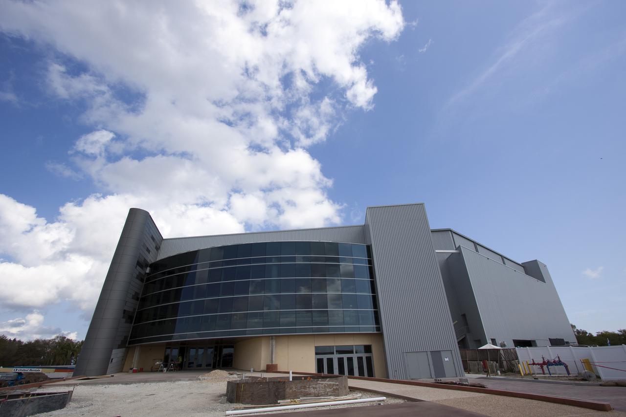 CAPE CANAVERAL, Fla. -- The 'Space Shuttle Atlantis' exhibit is nearing completion at the Kennedy Space Center Visitor Complex with its grand opening scheduled for June 29, 2013. Last November, the space shuttle Atlantis made its historic final journey to its new home, traveling 10 miles from the Kennedy Space Center's Vehicle Assembly Building to the spaceport's visitor complex. The new $100 million Atlantis facility will be a 90,000-square-foot, interactive exhibit that tells the story of the 30-year Space Shuttle Program and highlights the future of space exploration. Photo credit: NASA_Jim Grossmann