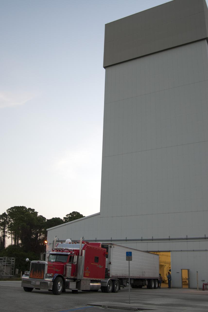 CAPE CANAVERAL, Fla. – At NASA’s Kennedy Space Center in Florida, a truck arrives at the Launch Abort System Facility with a launch abort motor from Alliant Techsystems, or ATK, for Exploration Flight Test 1, or EFT-1, of the agency’s Orion Multi-Purpose Crew Vehicle. ATK’s abort motor is part of Orion’s Launch Abort System, which is designed to safely pull the Orion crew module away from the launch vehicle in the event of an emergency on the launch pad or during the initial ascent of NASA’s Space Launch System, or SLS, rocket. The test flight abort motor is configured with inert propellant.   Orion is the exploration spacecraft designed to carry crews to space beyond low Earth orbit. It will provide emergency abort capability, sustain the crew during the space travel and provide safe re-entry from deep space return velocities. Orion’s first unpiloted test flight is scheduled to launch in 2014 atop a Delta IV rocket. A second uncrewed flight test is scheduled for 2017 on the SLS rocket. For more information, visit http:__www.nasa.gov_orion. Photo credit: NASA_Charisse Nahser