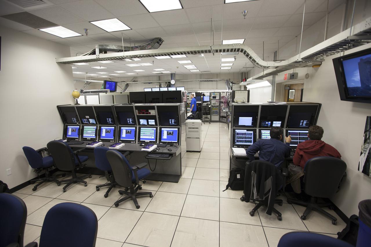 VANDENBERG AFB, Calif. -- From their positions in the telemetry laboratory at Vandenberg Air Force Base, engineers and technicians monitor the countdown for a United Launch Alliance Atlas V with the Landsat Data Continuity Mission, or LDCM, satellite prior to liftoff. The Landsat Data Continuity Mission, or LDCM, is the future of Landsat satellites. It will continue to obtain valuable data and imagery to be used in agriculture, education, business, science, and government. The Landsat Program provides repetitive acquisition of high resolution multispectral data of the Earth's surface on a global basis. The data from the Landsat spacecraft constitute the longest record of the Earth's continental surfaces as seen from space. It is a record unmatched in quality, detail, coverage, and value. Liftoff is planned for Feb. 11, 2013 aboard a United Launch Alliance Atlas V rocket. For more information, visit: http:__www.nasa.gov_mission_pages_landsat_main_index.html Photo credit: NASA_ Kim Shiflett