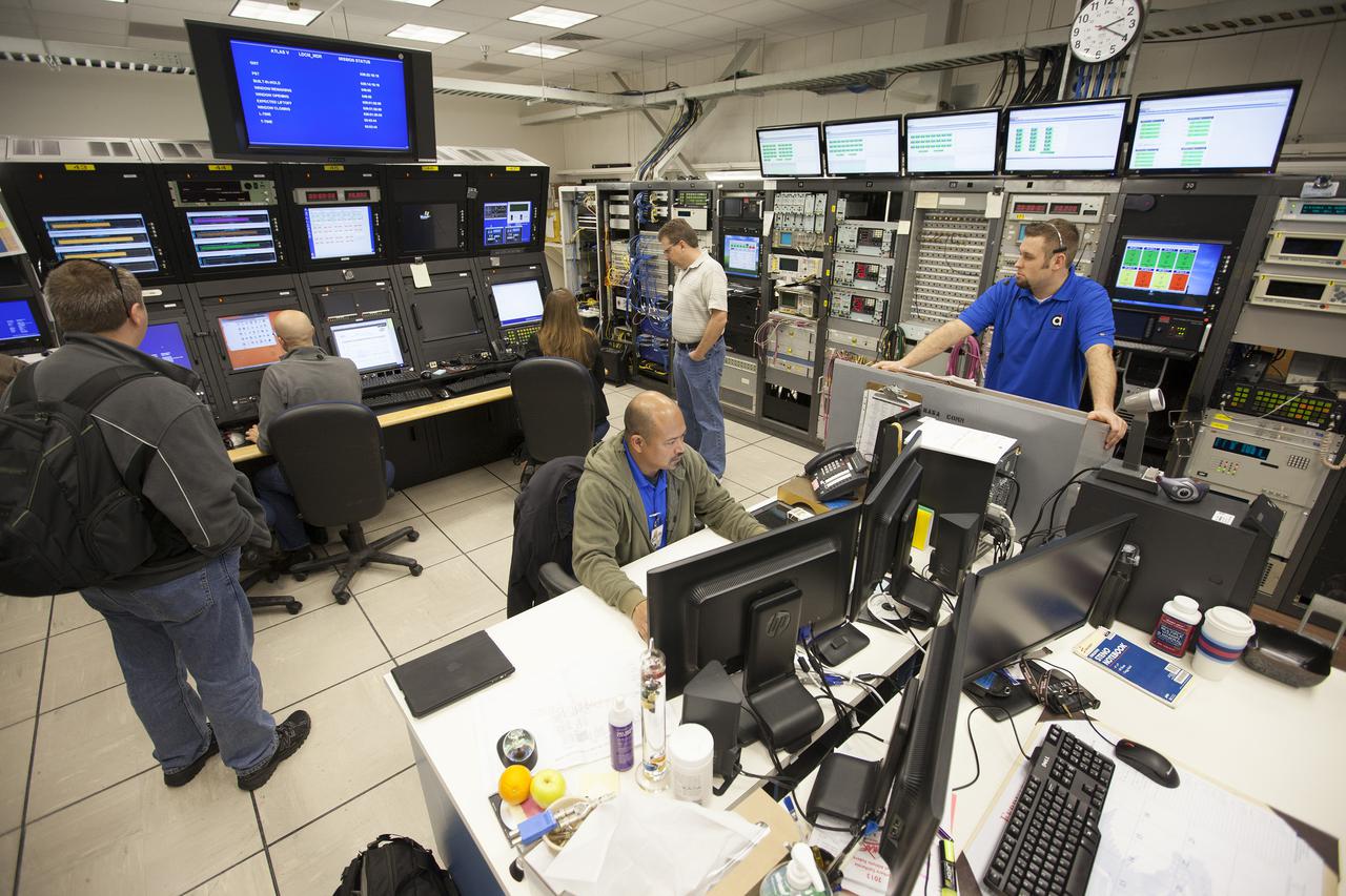 VANDENBERG AFB, Calif. -- From their positions in the telemetry laboratory at Vandenberg Air Force Base, engineers and technicians monitor the countdown for a United Launch Alliance Atlas V with the Landsat Data Continuity Mission, or LDCM, satellite prior to liftoff. The Landsat Data Continuity Mission, or LDCM, is the future of Landsat satellites. It will continue to obtain valuable data and imagery to be used in agriculture, education, business, science, and government. The Landsat Program provides repetitive acquisition of high resolution multispectral data of the Earth's surface on a global basis. The data from the Landsat spacecraft constitute the longest record of the Earth's continental surfaces as seen from space. It is a record unmatched in quality, detail, coverage, and value. Liftoff is planned for Feb. 11, 2013 aboard a United Launch Alliance Atlas V rocket. For more information, visit: http:__www.nasa.gov_mission_pages_landsat_main_index.html Photo credit: NASA_ Kim Shiflett