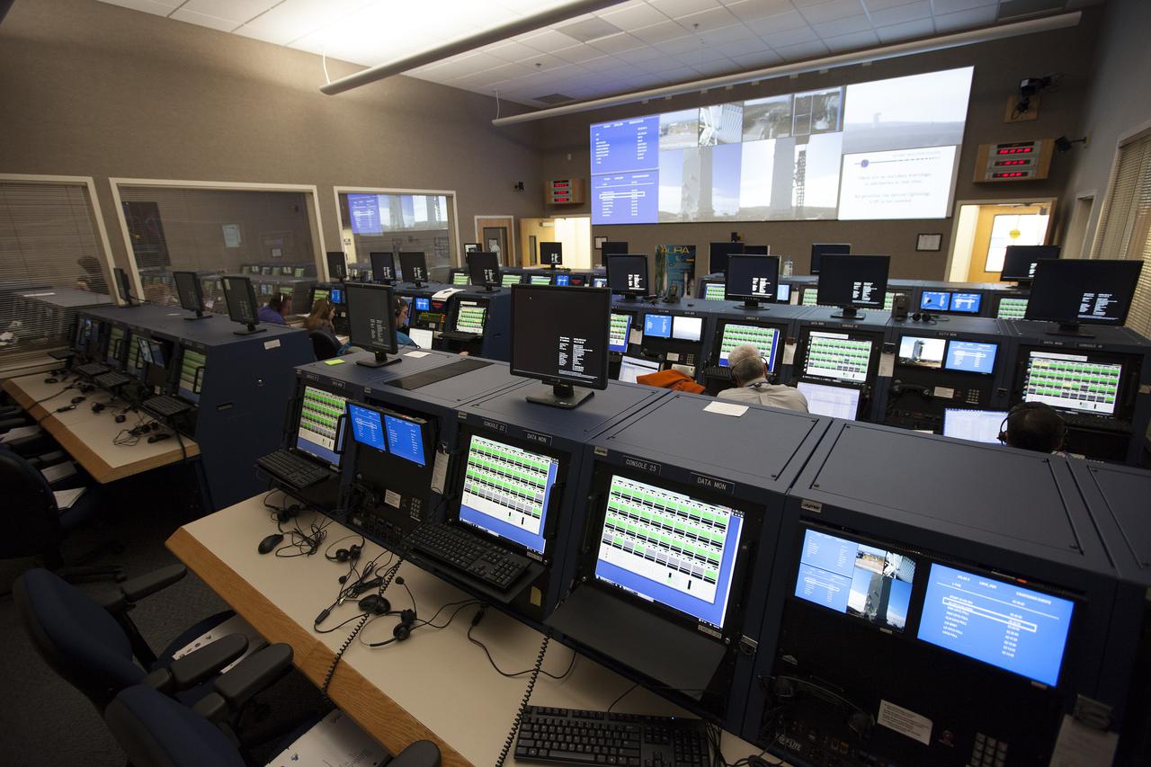 VANDENBERG AFB, Calif. -- From their consoles in the NASA Launch Vehicle Data Center at Vandenberg Air Force Base, engineers monitor the countdown for a United Launch Alliance Atlas V with the Landsat Data Continuity Mission, or LDCM, satellite prior to liftoff. The Landsat Data Continuity Mission, or LDCM, is the future of Landsat satellites. It will continue to obtain valuable data and imagery to be used in agriculture, education, business, science, and government. The Landsat Program provides repetitive acquisition of high resolution multispectral data of the Earth's surface on a global basis. The data from the Landsat spacecraft constitute the longest record of the Earth's continental surfaces as seen from space. It is a record unmatched in quality, detail, coverage, and value. Liftoff is planned for Feb. 11, 2013 aboard a United Launch Alliance Atlas V rocket. For more information, visit: http:__www.nasa.gov_mission_pages_landsat_main_index.html Photo credit: NASA_ Kim Shiflett