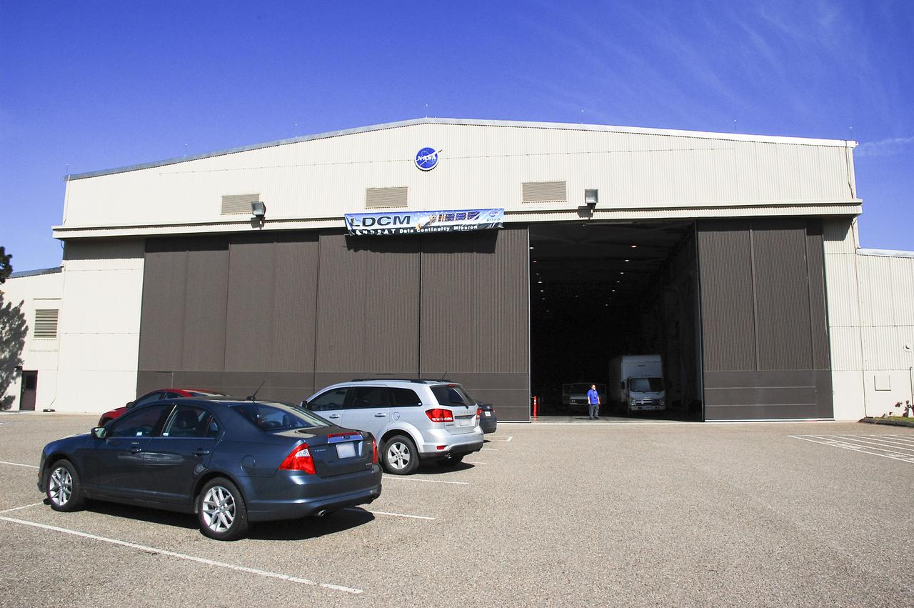 VANDENBERG AFB, Calif. – A NASA hangar at Vandenberg Air Force Base in California shows the upcoming Landsat Data Continuity Mission banner. Photo credit: NASA_Ben Smegelsky
