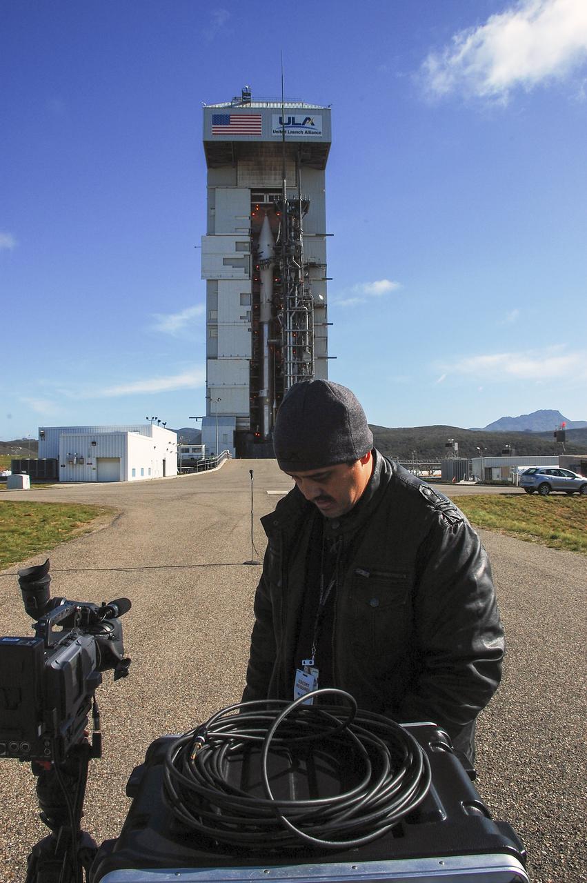 VANDENBERG AFB, Calif. – A NASA TV technician sets up equipment to record the launch of a United Launch Alliance Atlas V rocket carrying the Landsat Data Continuity Mission spacecraft from Vandenberg Air Force Base in California. Photo credit: NASA_Ben Smegelsky