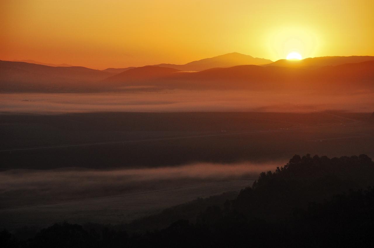 VANDENBERG AFB, Calif. – Sunrise over Vandenberg Air Force Base in California on the morning of the launch of a United Launch Alliance Atlas V rocket carrying the Landsat Data Continuity Mission spacecraft from. Photo credit: NASA_Ben Smegelsky