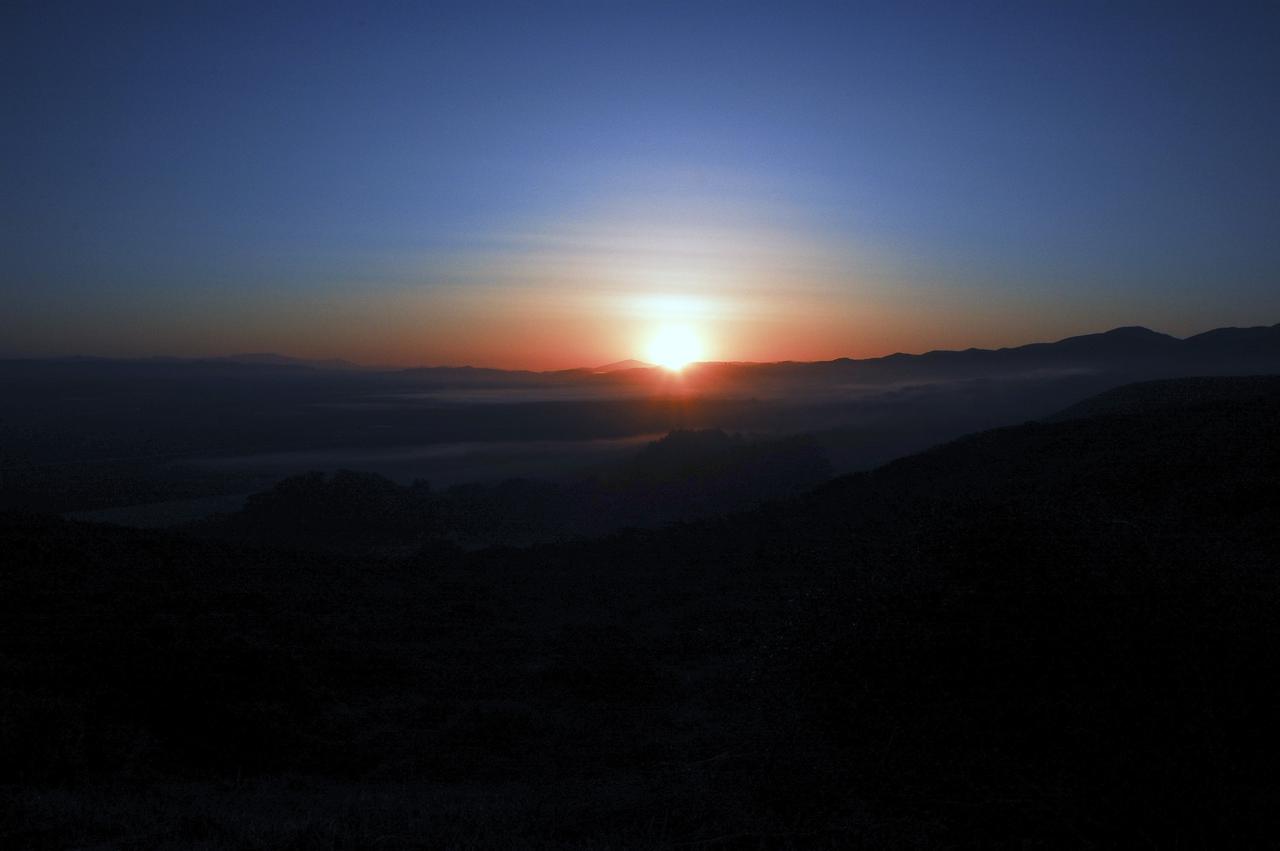 KSC-2013-1641 – VANDENBERG AFB, Calif. – Sunrise over Vandenberg Air Force Base in California on the morning of the launch of a United Launch Alliance Atlas V rocket carrying the Landsat Data Continuity Mission spacecraft from. Photo credit: NASA_Ben Smegelsky