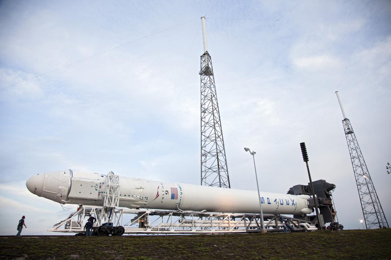 CAPE CANAVERAL, Fla. - At Cape Canaveral Air Force Station in Florida, the SpaceX Falcon 9 rocket approaches the launch pad at Launch Complex 40 for a test firing of the vehicle's nine Merlin first-stage engines. The test is part of prelaunch preparations for the upcoming SpaceX 2 mission.  Liftoff of the SpaceX Falcon 9 rocket and Dragon spacecraft is planned for March 1, 2013, at 10:10 a.m. EST, from Space Launch Complex-40 at Cape Canaveral Air Force Station, Fla. Dragon will be making its third trip to the space station. It will carry supplies and experiments to the orbiting laboratory. The mission is the second of 12 SpaceX flights contracted by NASA to resupply the space station. For more information, visit http:__www.nasa.gov_mission_pages_station_structure_launch_spacex2-feature.html Photo credit: NASA_Frankie Martin
