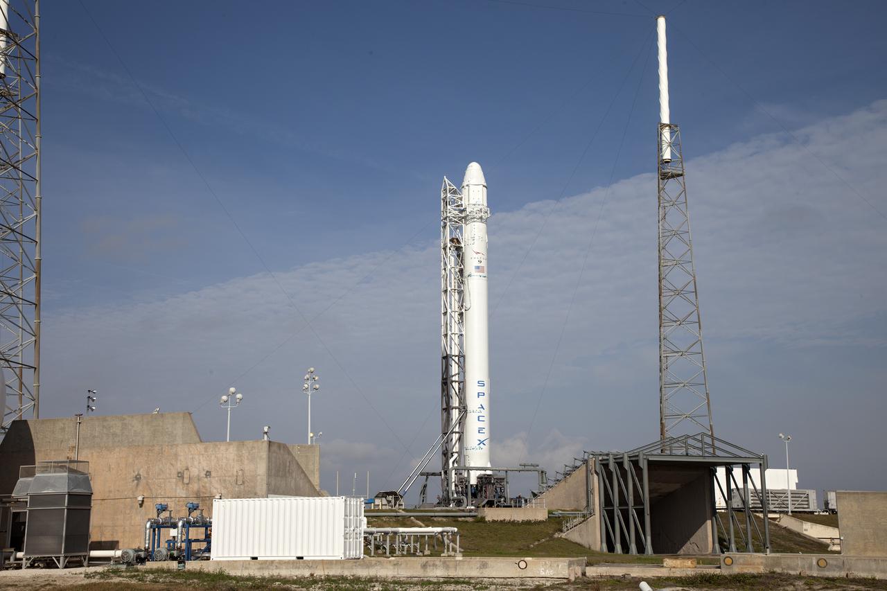 CAPE CANAVERAL, Fla. - At Cape Canaveral Air Force Station in Florida, the SpaceX Falcon 9 rocket stands on the launch pad at Launch Complex 40, awaiting a test firing of the vehicle's nine Merlin first-stage engines. The test is part of prelaunch preparations for the upcoming SpaceX 2 mission.   Liftoff of the SpaceX Falcon 9 rocket and Dragon spacecraft is planned for March 1, 2013, at 10:10 a.m. EST, from Space Launch Complex-40 at Cape Canaveral Air Force Station, Fla. Dragon will be making its third trip to the space station. It will carry supplies and experiments to the orbiting laboratory. The mission is the second of 12 SpaceX flights contracted by NASA to resupply the space station. For more information, visit http:__www.nasa.gov_mission_pages_station_structure_launch_spacex2-feature.html Photo credit: NASA_Frankie Martin