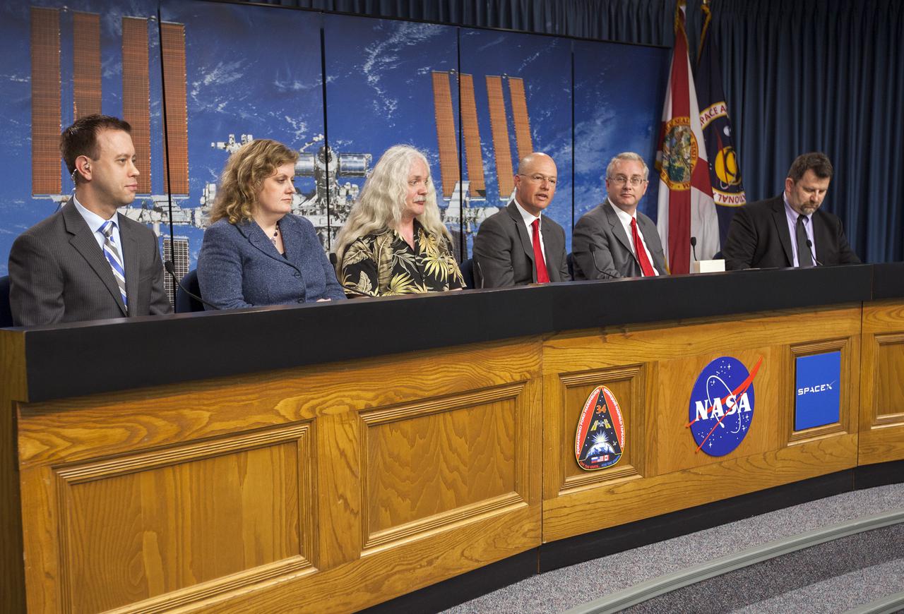 CAPE CANAVERAL, Fla. - Media attending a pre-launch news conference at the Kennedy Space Center, Fla. heard from officials who discussed payloads to be launched aboard a SpaceX Dragon capsule. From the left are: Josh Byerly of NASA Public Affairs at the Johnson Space Center, Julie Robinson, NASA program scientist for the International Space Station, Simon Gilroy, Ph.D., BRIC-17 Lead Investigator from the University of Wisconsin, Marshall Porterfield, division director of the Life and Physical Sciences at NASA Headquarters, Michael Johnson, chief technical officer for NanoRacks, and Michael Roberts, research scientist with the Center for Advancement of Science in Space.   Scheduled for launch March 1 atop a Falcon 9 rocket, the SpaceX Dragon capsule will be making its third trip to the space station. The mission is the second of 12 SpaceX flights contracted by NASA to resupply the orbiting laboratory. For more information, visit http:__www.nasa.gov_mission_pages_station_structure_launch_spacex2-feature.html Photo credit: NASA_Kim Shiflett