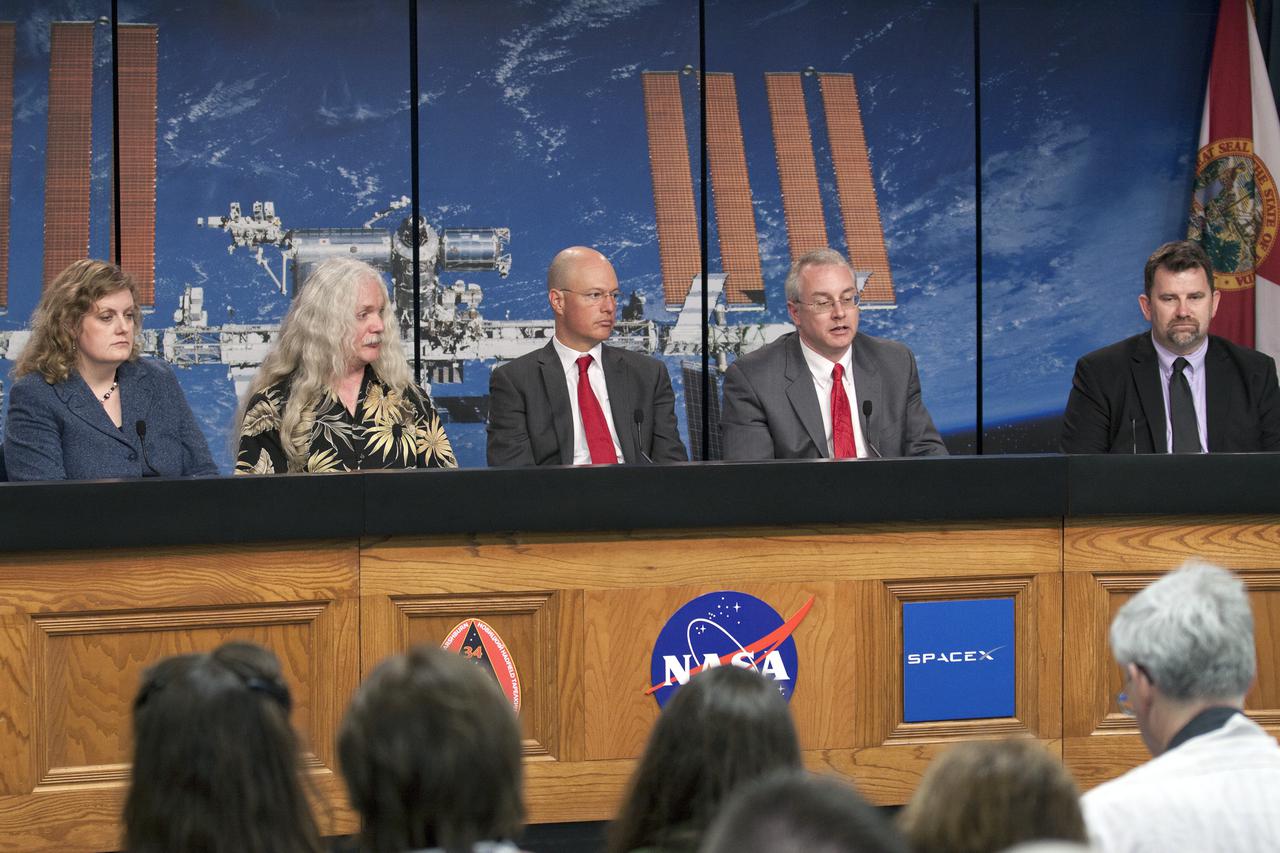 CAPE CANAVERAL, Fla. - Media attending a pre-launch news conference at the Kennedy Space Center, Fla. heard from officials who discussed payloads to be launched aboard a SpaceX Dragon capsule. From the left are: Julie Robinson, NASA program scientist for the International Space Station, Simon Gilroy, Ph.D., BRIC-17 Lead Investigator from the University of Wisconsin, Marshall Porterfield, division director of the Life and Physical Sciences at NASA Headquarters, Michael Johnson, chief technical officer for NanoRacks, and Michael Roberts, research scientist with the Center for Advancement of Science in Space.   Scheduled for launch March 1 atop a Falcon 9 rocket, the SpaceX Dragon capsule will be making its third trip to the space station. The mission is the second of 12 SpaceX flights contracted by NASA to resupply the orbiting laboratory. For more information, visit http:__www.nasa.gov_mission_pages_station_structure_launch_spacex2-feature.html Photo credit: NASA_Kim Shiflett