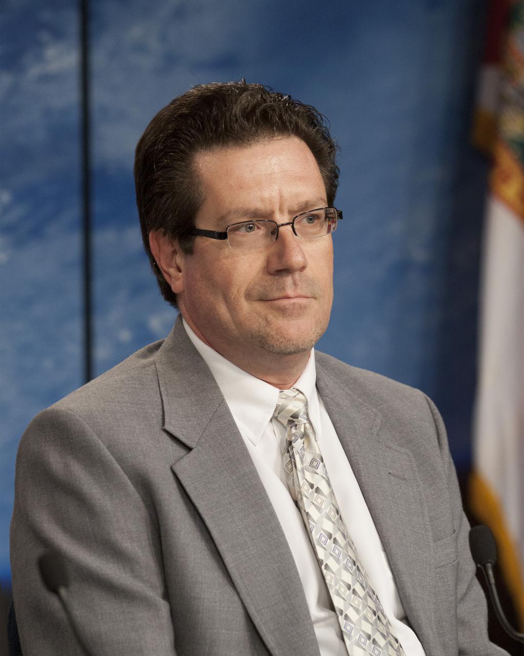 CAPE CANAVERAL, Fla. - Media attending a pre-launch news conference at the Kennedy Space Center, Fla. heard from Joel Tumbiolo, launch weather officer for the 45th Weather Squadron at Cape Canaveral Air Force Station. Scheduled for launch March 1 atop a Falcon 9 rocket, the SpaceX Dragon capsule will be making its third trip to the space station. The mission is the second of 12 SpaceX flights contracted by NASA to resupply the orbiting laboratory. For more information, visit http:__www.nasa.gov_mission_pages_station_structure_launch_spacex2-feature.html Photo credit: NASA_Kim Shiflett