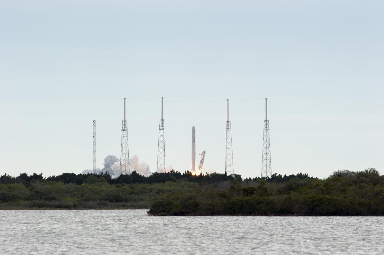 CAPE CANAVERAL, Fla. -- A Space Exploration Technologies, or SpaceX, Falcon 9 rocket lifts off Space Launch Complex 40 on Cape Canaveral Air Force Station in Florida at 10:10 a.m. EST, carrying a Dragon capsule filled with cargo to orbit.  The SpaceX Dragon capsule is making its third trip to the International Space Station, following a demonstration flight in May 2012 and the first resupply mission in October 2012. The mission is the second of 12 SpaceX flights contracted by NASA to resupply the orbiting laboratory. For more information, visit http:__www.nasa.gov_mission_pages_station_structure_launch_spacex2-feature.html.  Photo credit: NASA_Kim Shiflett