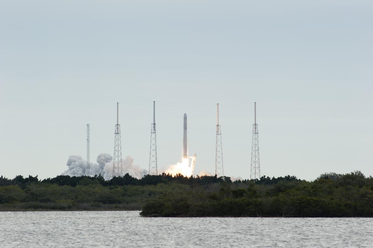 CAPE CANAVERAL, Fla. -- The engines ignite under the Space Exploration Technologies, or SpaceX, Falcon 9 rocket at Space Launch Complex 40 on Cape Canaveral Air Force Station in Florida. The Dragon capsule filled with cargo began its journey to orbit at 10:10 a.m. EST.  The SpaceX Dragon capsule is making its third trip to the International Space Station, following a demonstration flight in May 2012 and the first resupply mission in October 2012. The mission is the second of 12 SpaceX flights contracted by NASA to resupply the orbiting laboratory. For more information, visit http:__www.nasa.gov_mission_pages_station_structure_launch_spacex2-feature.html.  Photo credit: NASA_Kim Shiflett