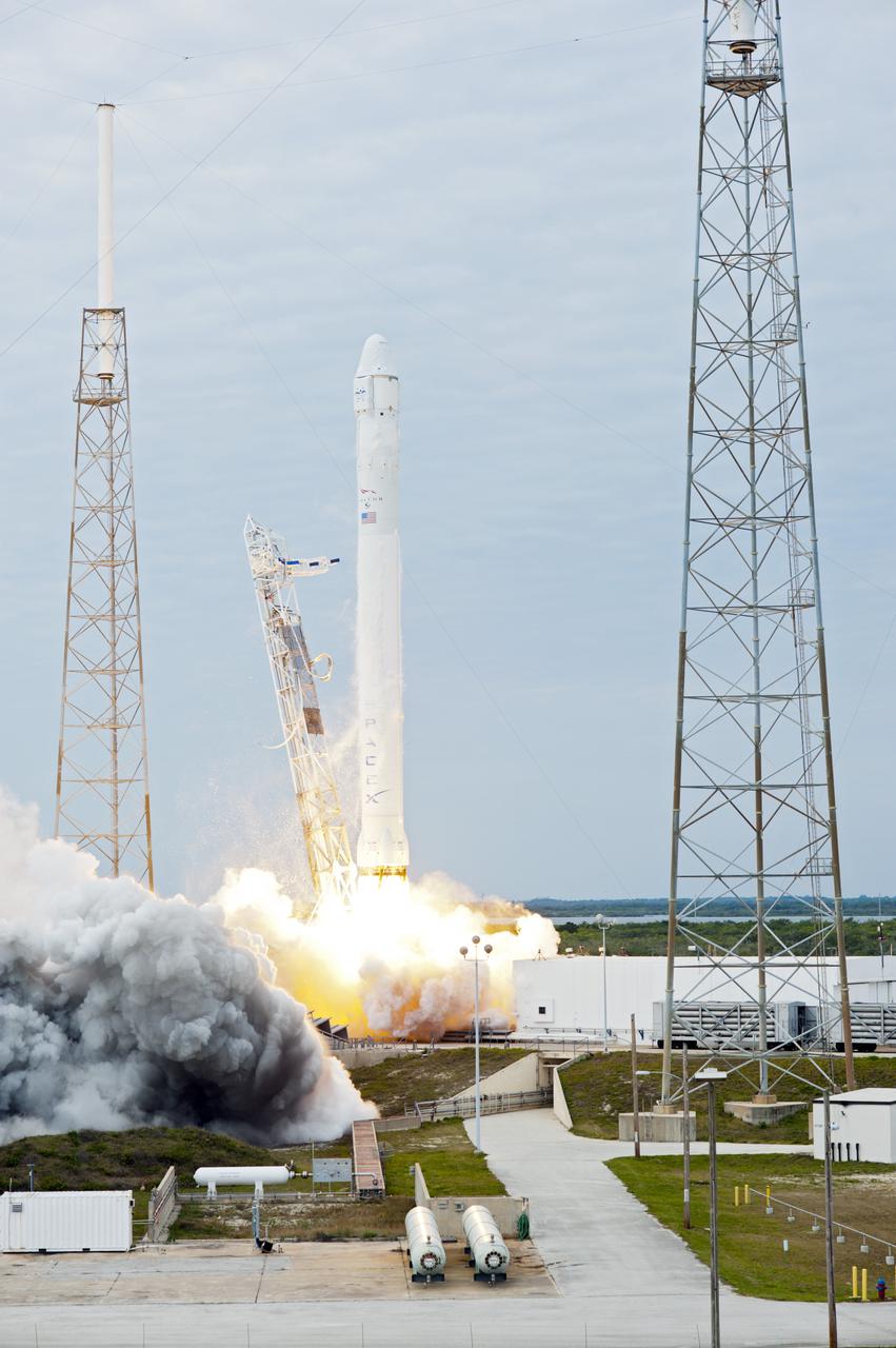 CAPE CANAVERAL, Fla. -- A Space Exploration Technologies, or SpaceX, Falcon 9 rocket lifts off Space Launch Complex 40 on Cape Canaveral Air Force Station in Florida at 10:10 a.m. EST, carrying a Dragon capsule filled with cargo. The SpaceX Dragon capsule is making its third trip to the International Space Station, following a demonstration flight in May 2012 and the first resupply mission in October 2012. The SpaceX-2 mission is the second of 12 SpaceX flights contracted by NASA to resupply the orbiting laboratory. For more information, visit http:__www.nasa.gov_mission_pages_station_structure_launch_spacex2-feature.html Photo credit: NASA_Tony Gray and Robert Murray
