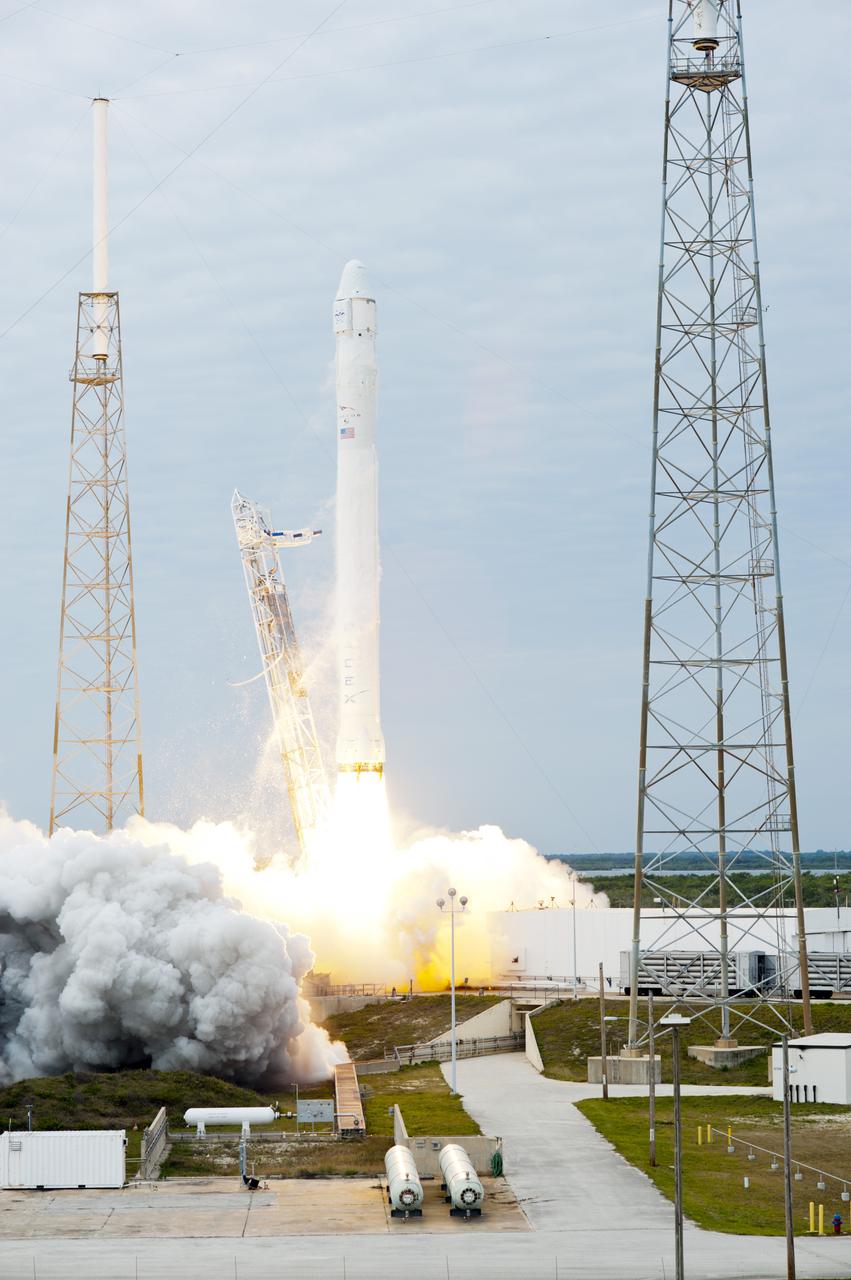 CAPE CANAVERAL, Fla. -- A Space Exploration Technologies, or SpaceX, Falcon 9 rocket lifts off Space Launch Complex 40 on Cape Canaveral Air Force Station in Florida at 10:10 a.m. EST, carrying a Dragon capsule filled with cargo. The SpaceX Dragon capsule is making its third trip to the International Space Station, following a demonstration flight in May 2012 and the first resupply mission in October 2012. The SpaceX-2 mission is the second of 12 SpaceX flights contracted by NASA to resupply the orbiting laboratory. For more information, visit http:__www.nasa.gov_mission_pages_station_structure_launch_spacex2-feature.html Photo credit: NASA_Tony Gray and Robert Murray