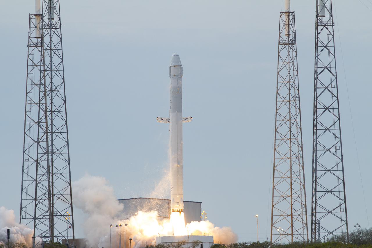 CAPE CANAVERAL, Fla. -- A Space Exploration Technologies, or SpaceX, Falcon 9 rocket lifts off Space Launch Complex 40 on Cape Canaveral Air Force Station in Florida at 10:10 a.m. EST, carrying a Dragon capsule filled with cargo. The SpaceX Dragon capsule is making its third trip to the International Space Station, following a demonstration flight in May 2012 and the first resupply mission in October 2012. The SpaceX-2 mission is the second of 12 SpaceX flights contracted by NASA to resupply the orbiting laboratory. For more information, visit http:__www.nasa.gov_mission_pages_station_structure_launch_spacex2-feature.html Photo credit: NASA_George Roberts