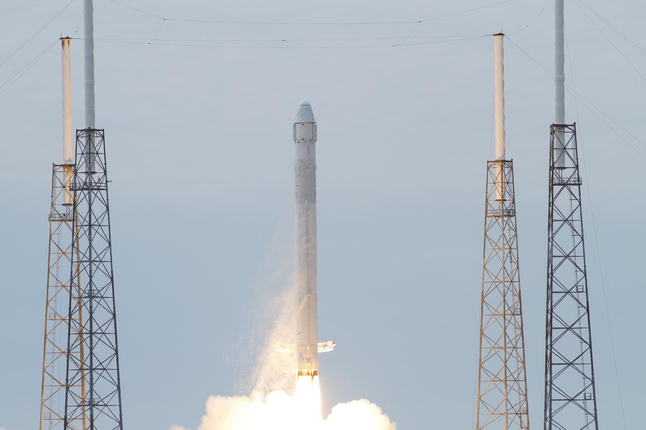 CAPE CANAVERAL, Fla. -- A Space Exploration Technologies, or SpaceX, Falcon 9 rocket lifts off Space Launch Complex 40 on Cape Canaveral Air Force Station in Florida at 10:10 a.m. EST, carrying a Dragon capsule filled with cargo. The SpaceX Dragon capsule is making its third trip to the International Space Station, following a demonstration flight in May 2012 and the first resupply mission in October 2012. The SpaceX-2 mission is the second of 12 SpaceX flights contracted by NASA to resupply the orbiting laboratory. For more information, visit http:__www.nasa.gov_mission_pages_station_structure_launch_spacex2-feature.html Photo credit: NASA_George Roberts