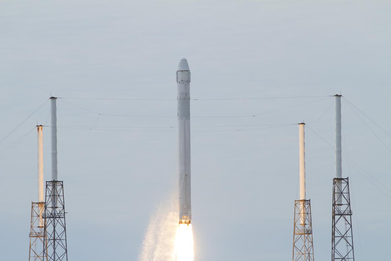 CAPE CANAVERAL, Fla. -- A Space Exploration Technologies, or SpaceX, Falcon 9 rocket lifts off Space Launch Complex 40 on Cape Canaveral Air Force Station in Florida at 10:10 a.m. EST, carrying a Dragon capsule filled with cargo. The SpaceX Dragon capsule is making its third trip to the International Space Station, following a demonstration flight in May 2012 and the first resupply mission in October 2012. The SpaceX-2 mission is the second of 12 SpaceX flights contracted by NASA to resupply the orbiting laboratory. For more information, visit http:__www.nasa.gov_mission_pages_station_structure_launch_spacex2-feature.html Photo credit: NASA_George Roberts
