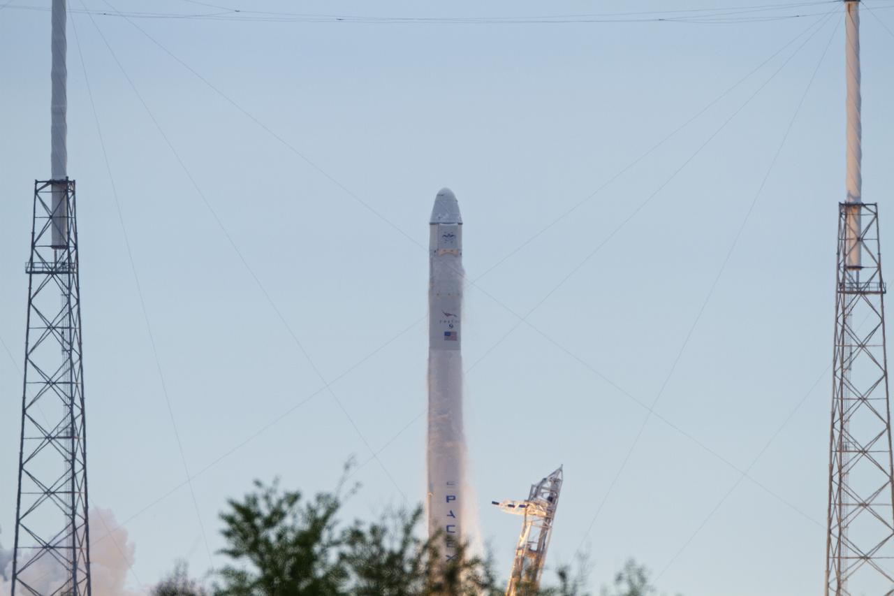 CAPE CANAVERAL, Fla. -- A Space Exploration Technologies, or SpaceX, Falcon 9 rocket lifts off Space Launch Complex 40 on Cape Canaveral Air Force Station in Florida at 10:10 a.m. EST, carrying a Dragon capsule filled with cargo. The SpaceX Dragon capsule is making its third trip to the International Space Station, following a demonstration flight in May 2012 and the first resupply mission in October 2012. The SpaceX-2 mission is the second of 12 SpaceX flights contracted by NASA to resupply the orbiting laboratory. For more information, visit http:__www.nasa.gov_mission_pages_station_structure_launch_spacex2-feature.html Photo credit: NASA_George Roberts