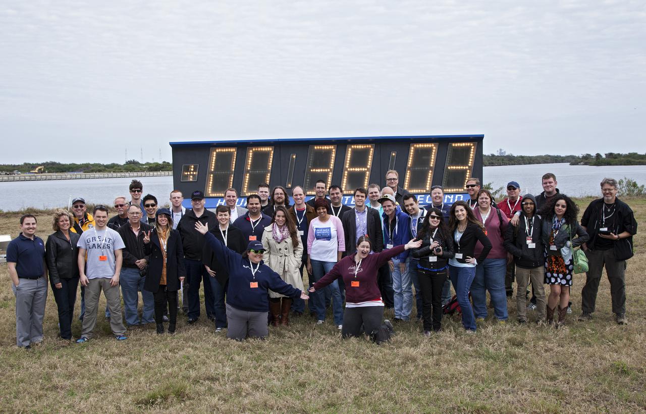 CAPE CANAVERAL, Fla. -- NASA social media followers pose for a group photo during two days of presentations on the launch of SpaceX-2.   The social media participants gathered at the Florida spaceport on Feb. 28 and March 1, to hear from key leaders who updated the space agency's current efforts. Photo credit: NASA_Kim Shiflett