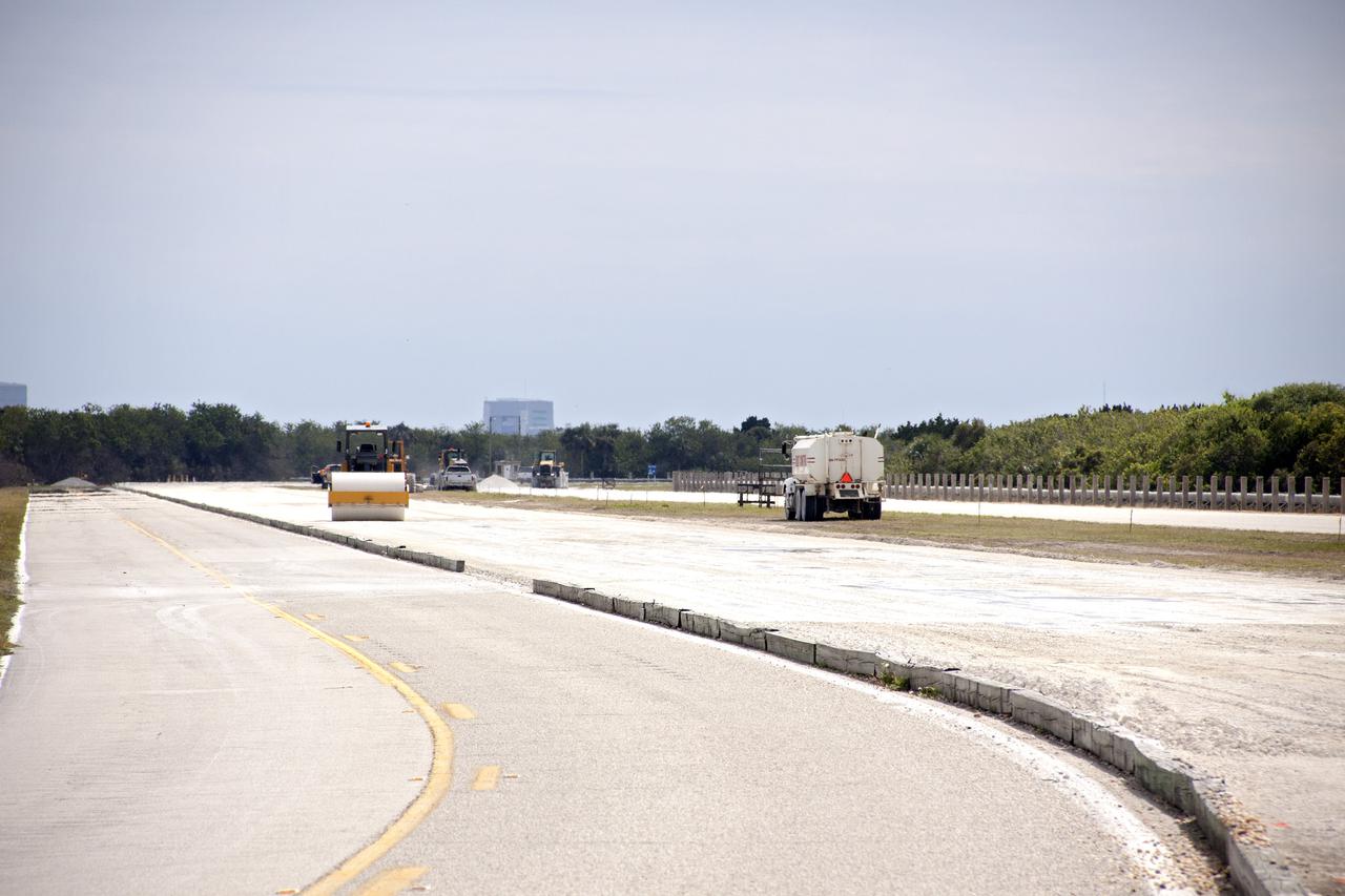 CAPE CANAVERAL, Fla. --Workers from Canaveral Construction in Mims, Fla., continue to re-grade the lime rock on the crawlerway near Launch Pad 39B at NASA’s Kennedy Space Center in Florida.  The crawlerway is being upgraded to improve the foundation and prepare it to support the weight of NASA’s Space Launch System, or SLS, and mobile launcher on the crawler-transporter during rollout. Workers are removing the original Alabama river rock and restoring the layer of lime rock below to its original depth. Then new river rock will be added on top. The Ground Systems Development and Operations, or GSDO, Program office at Kennedy is leading the center’s transformation to safely handle a variety of rockets and spacecraft. For more information about GSDO, visit: http:__go.nasa.gov_groundsystems.  Photo credit: NASA_Jim Grossmann
