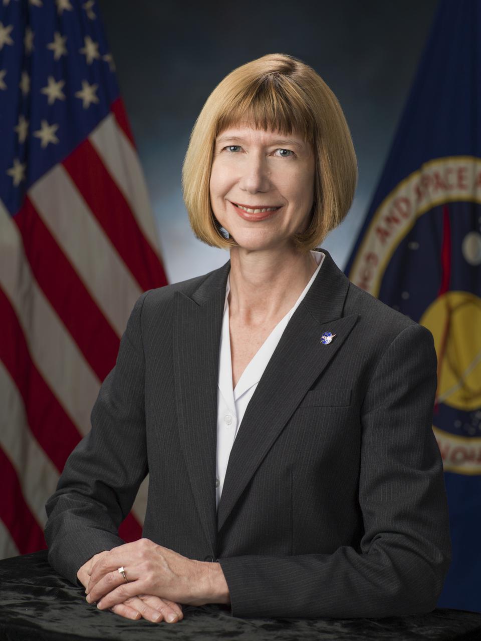 JOHNSON SPACE CENTER, Houston, Texas -- JSC2013-E-013609 -- Official portrait of Kathy Lueders, deputy manager of NASA's Commercial Crew Program at the agency's Johnson Space Center in Houston. To learn more about Lueders, go to http:__go.nasa.gov_107SaBn. Photo credit: NASA