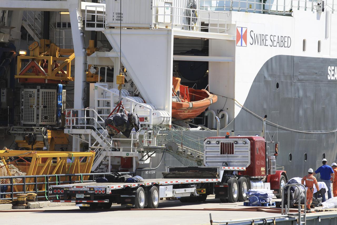 CAPE CANAVERAL, Fla. – Components for two of the F-1 engines that powered the first stage of the Saturn V rockets that lifted NASA's Apollo missions to the moon were recovered from the Atlantic Ocean March 21 by Jeff Bezos, the founder and Chief Executive Officer of the aerospace company Blue Origin and Amazon.com and arrived at Port Canaveral March 22. The engines will be restored by Bezos' team for public display. The engines were found some 14,000 feet underwater where they came to rest more than 40 years ago after sending astronauts into space on missions to the moon. Restoration may reveal exactly which engines were recovered, but Bezos said in a statement that the serial numbers were not immediately visible. Photo credit: NASA_Kim Shiflett