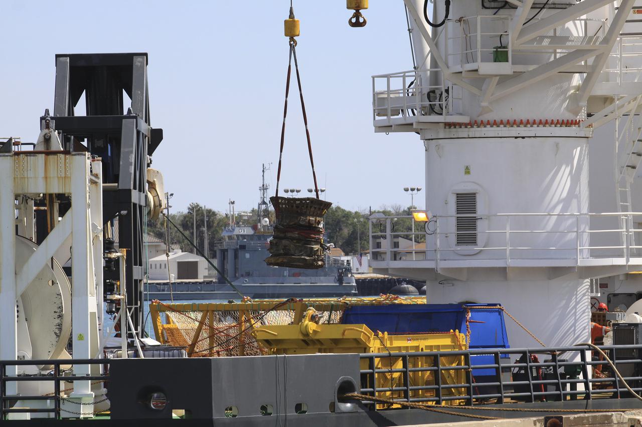 CAPE CANAVERAL, Fla. – Components for two of the F-1 engines that powered the first stage of the Saturn V rockets that lifted NASA's Apollo missions to the moon were recovered from the Atlantic Ocean March 21 by Jeff Bezos, the founder and Chief Executive Officer of the aerospace company Blue Origin and Amazon.com and arrived at Port Canaveral March 22. The engines will be restored by Bezos' team for public display. The engines were found some 14,000 feet underwater where they came to rest more than 40 years ago after sending astronauts into space on missions to the moon. Restoration may reveal exactly which engines were recovered, but Bezos said in a statement that the serial numbers were not immediately visible. Photo credit: NASA_Kim Shiflett